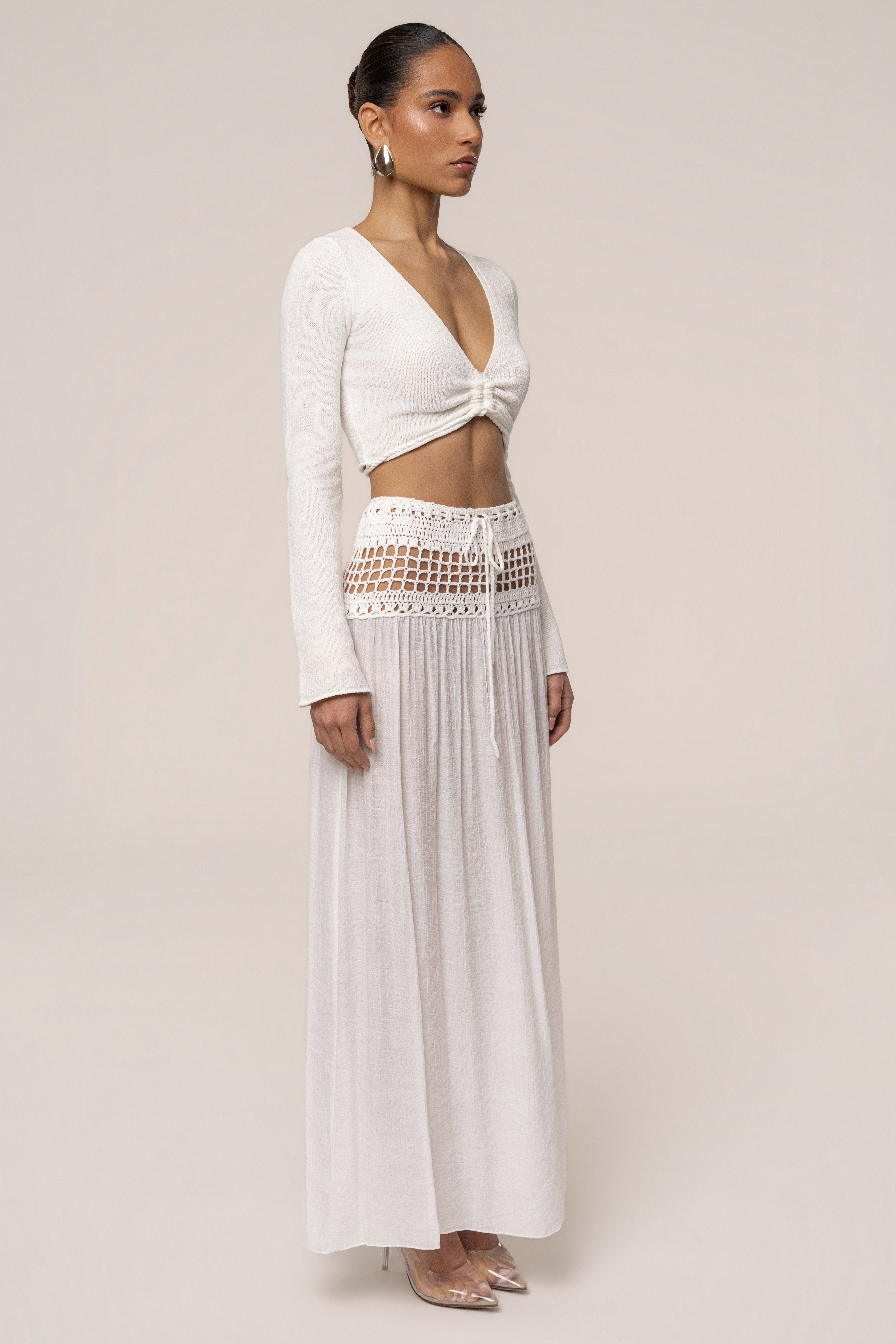 Ivory crochet maxi skirt by JLUXLABEL, flowy resort bottoms with intricate knit design, perfect for summer and beachwear.