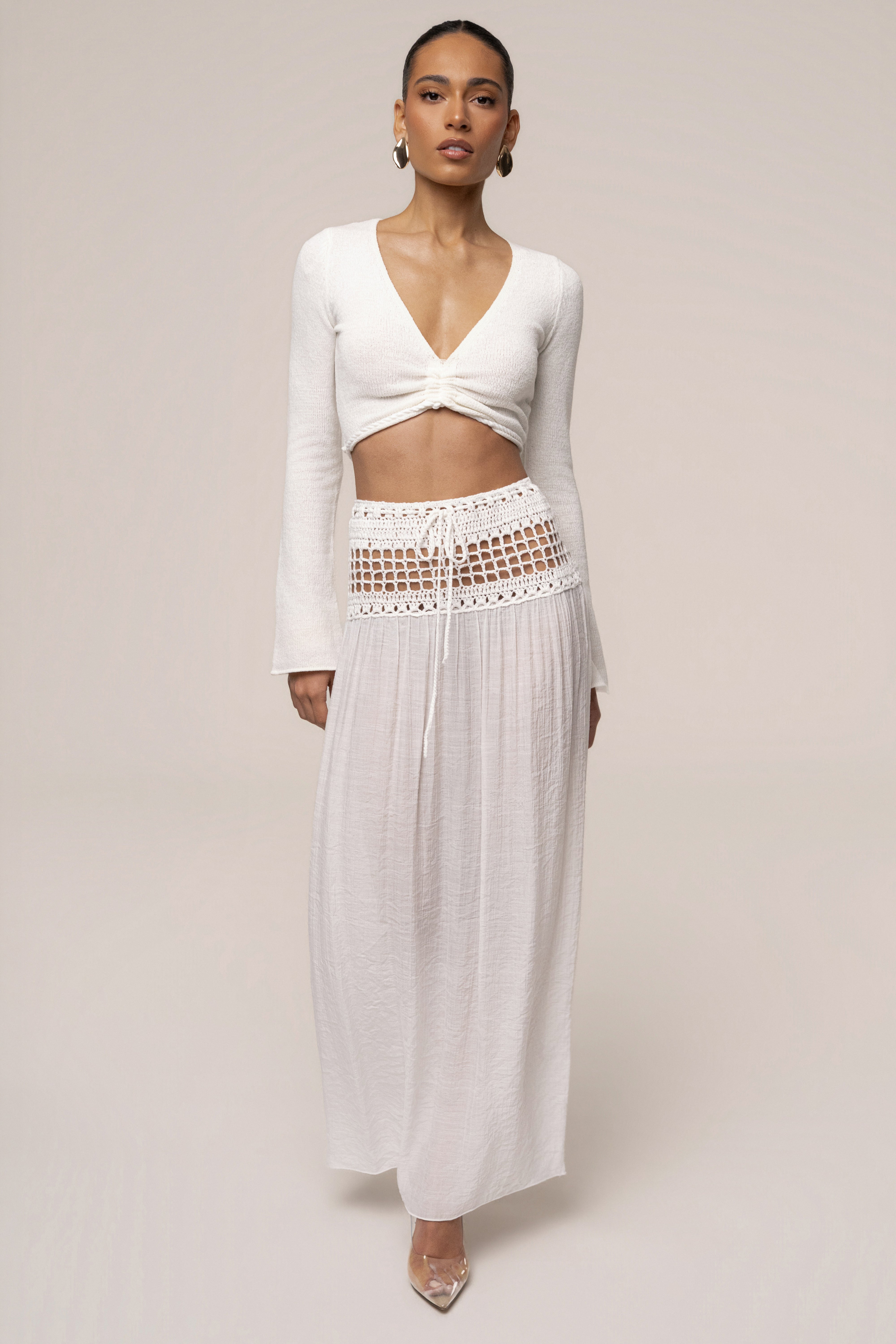 Ivory resort crochet maxi skirt by JLUXLABEL, flowing bohemian style with intricate crochet details, perfect for summer beachwear.