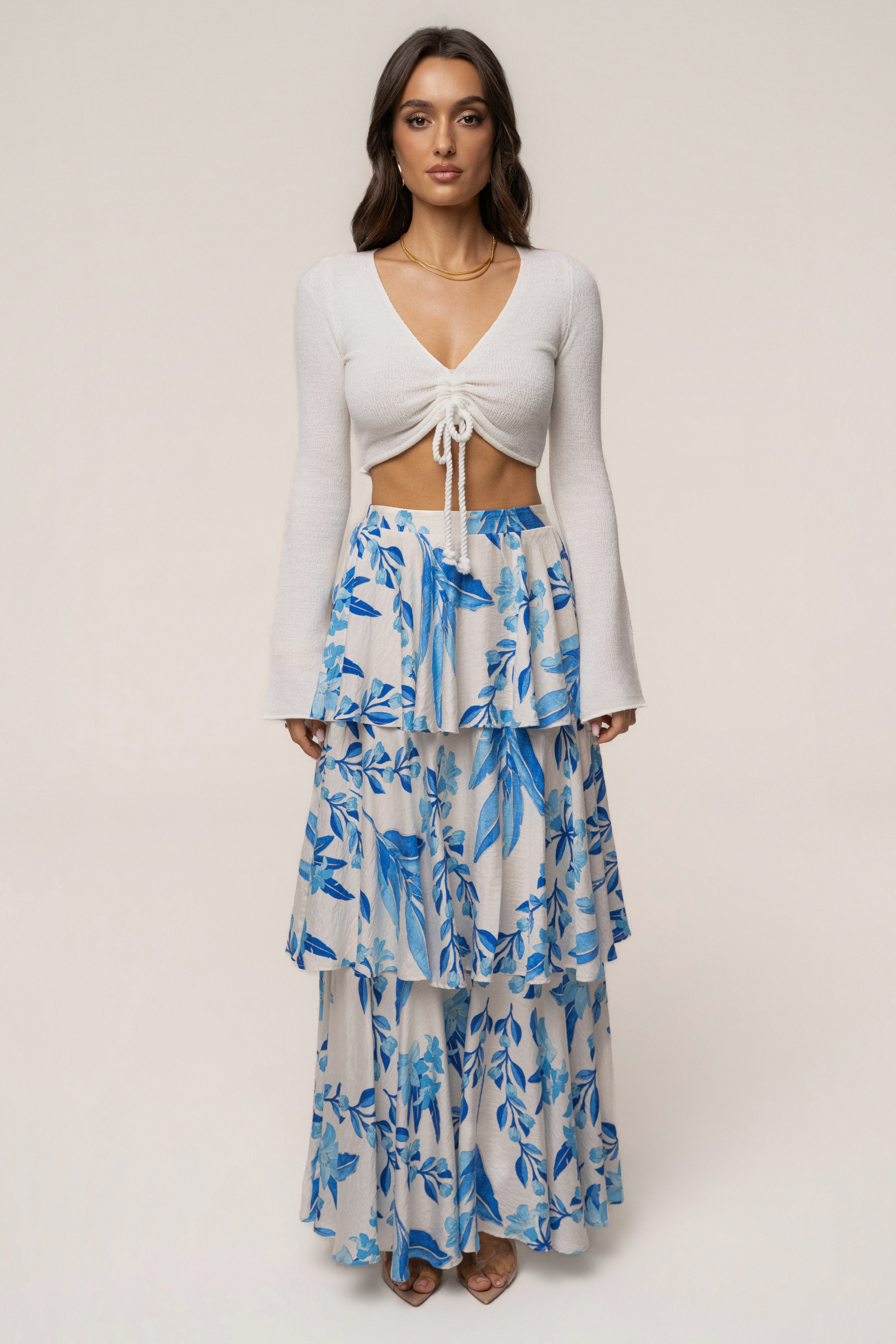 Blue floral Jasmine ruffle maxi skirt by JLUXLABEL, flowing fabric with ruffle details, perfect for casual or dressy occasions.