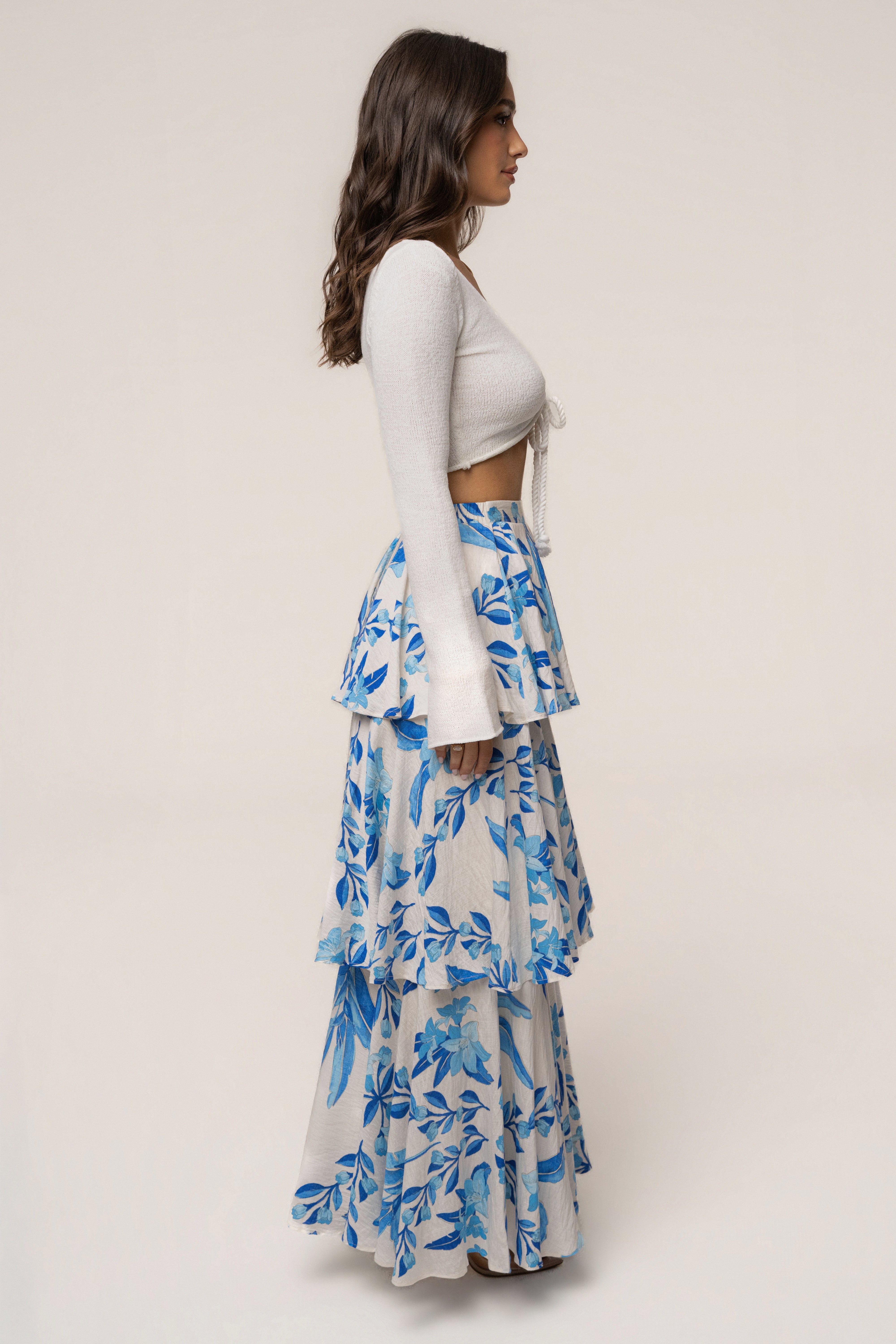 Blue floral Jasmine ruffle maxi skirt by JLUXLABEL, featuring a flowing design and ruffled hem, perfect for summer wear.