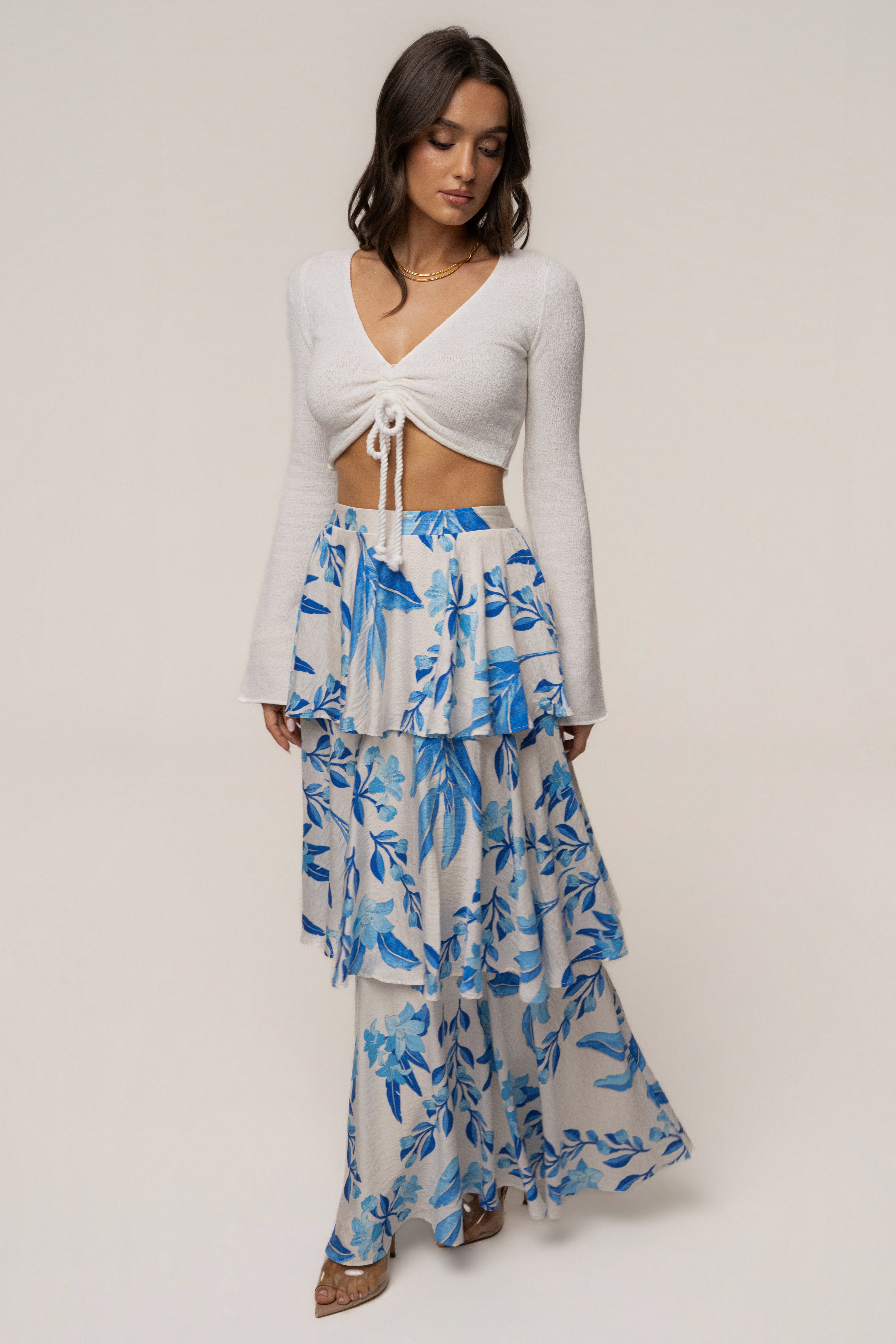 Blue floral Jasmine ruffle maxi skirt from JLUXLABEL, flowing skirt with floral pattern and ruffled hem, perfect for summer wear.