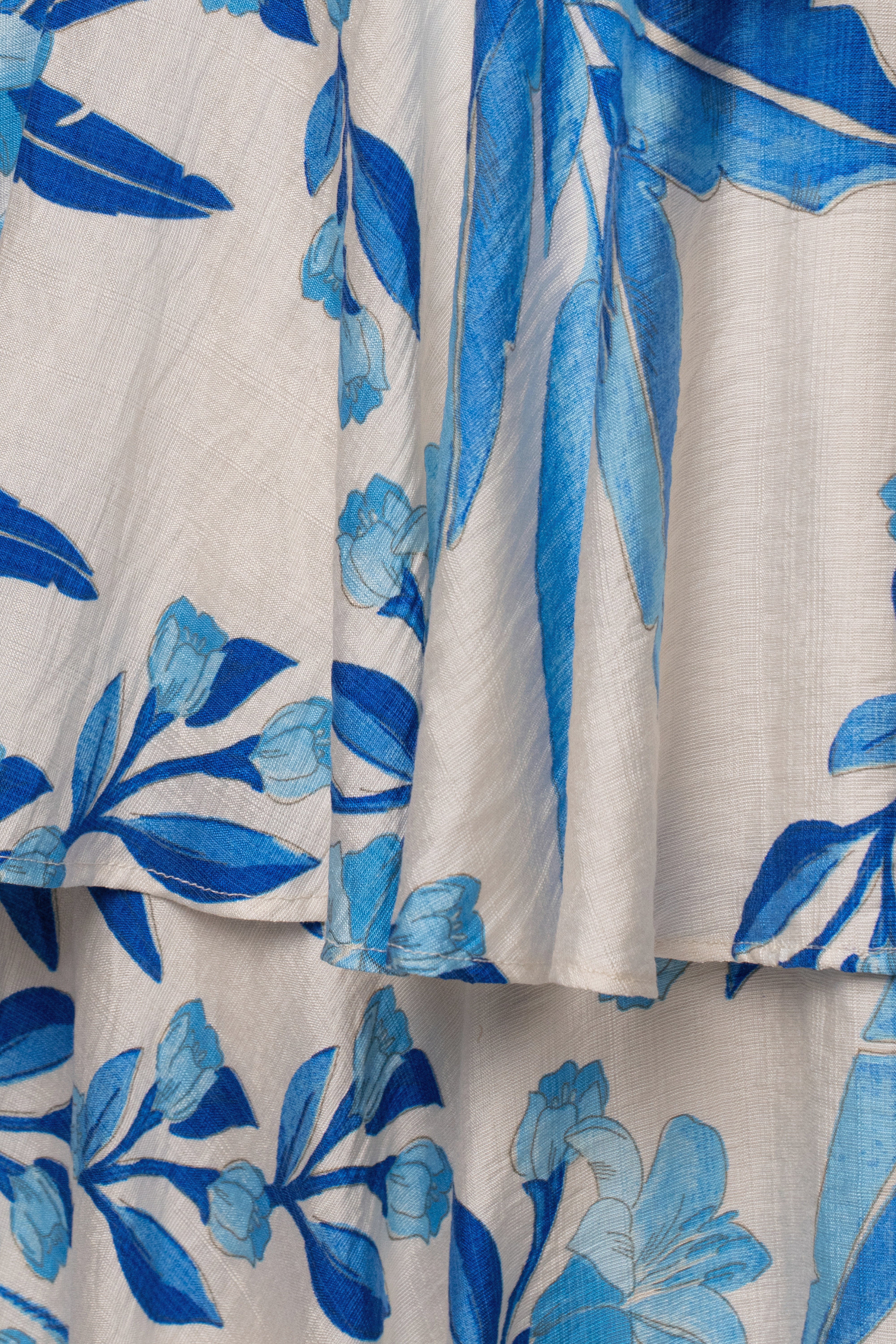 Blue floral jasmine ruffle maxi skirt from JLUXLABEL, featuring a flowy design with ruffled details and vibrant floral patterns.