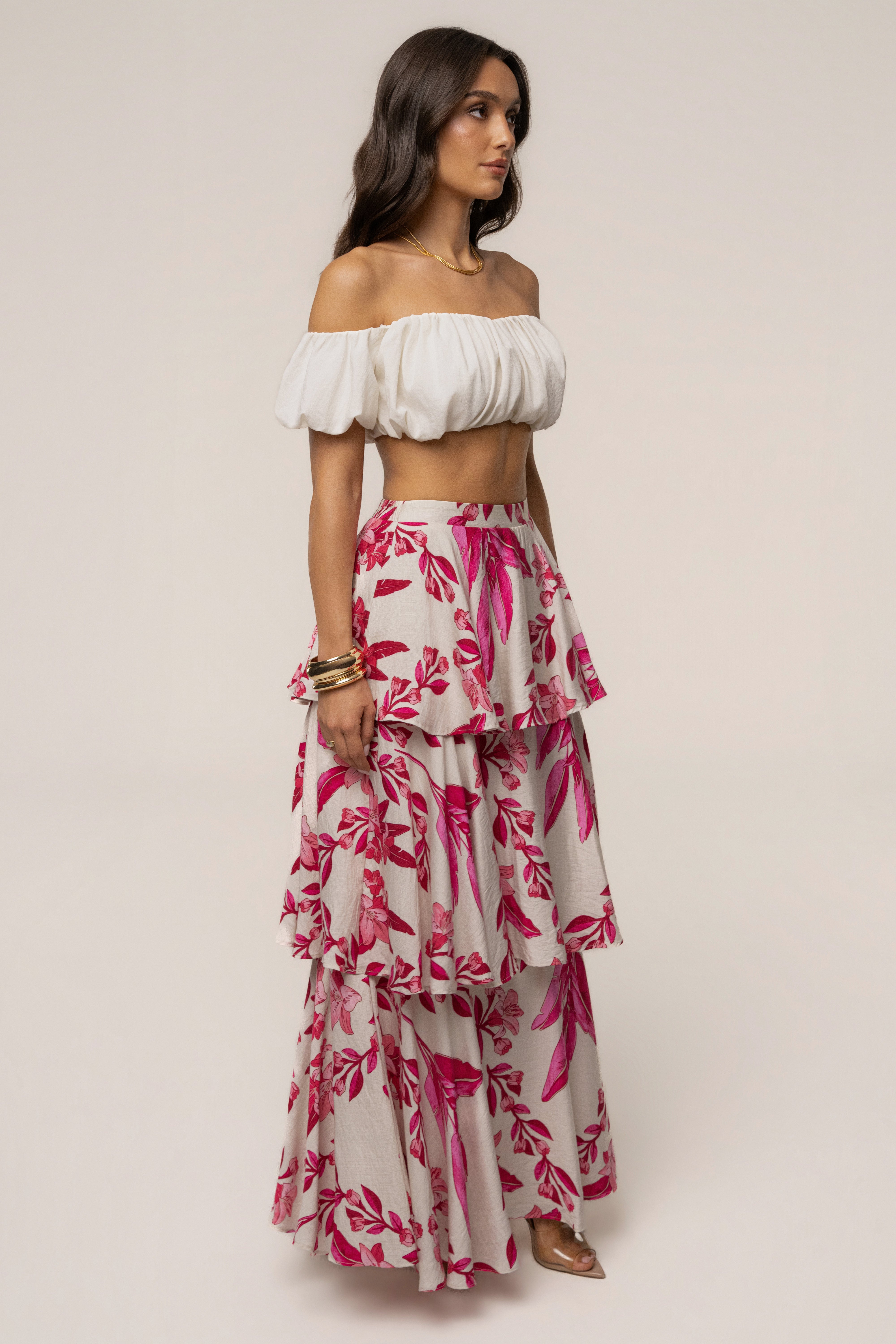 Pink floral Jasmine ruffle maxi skirt from JLUXLABEL, featuring a flowy design with floral print and ruffled hem.
