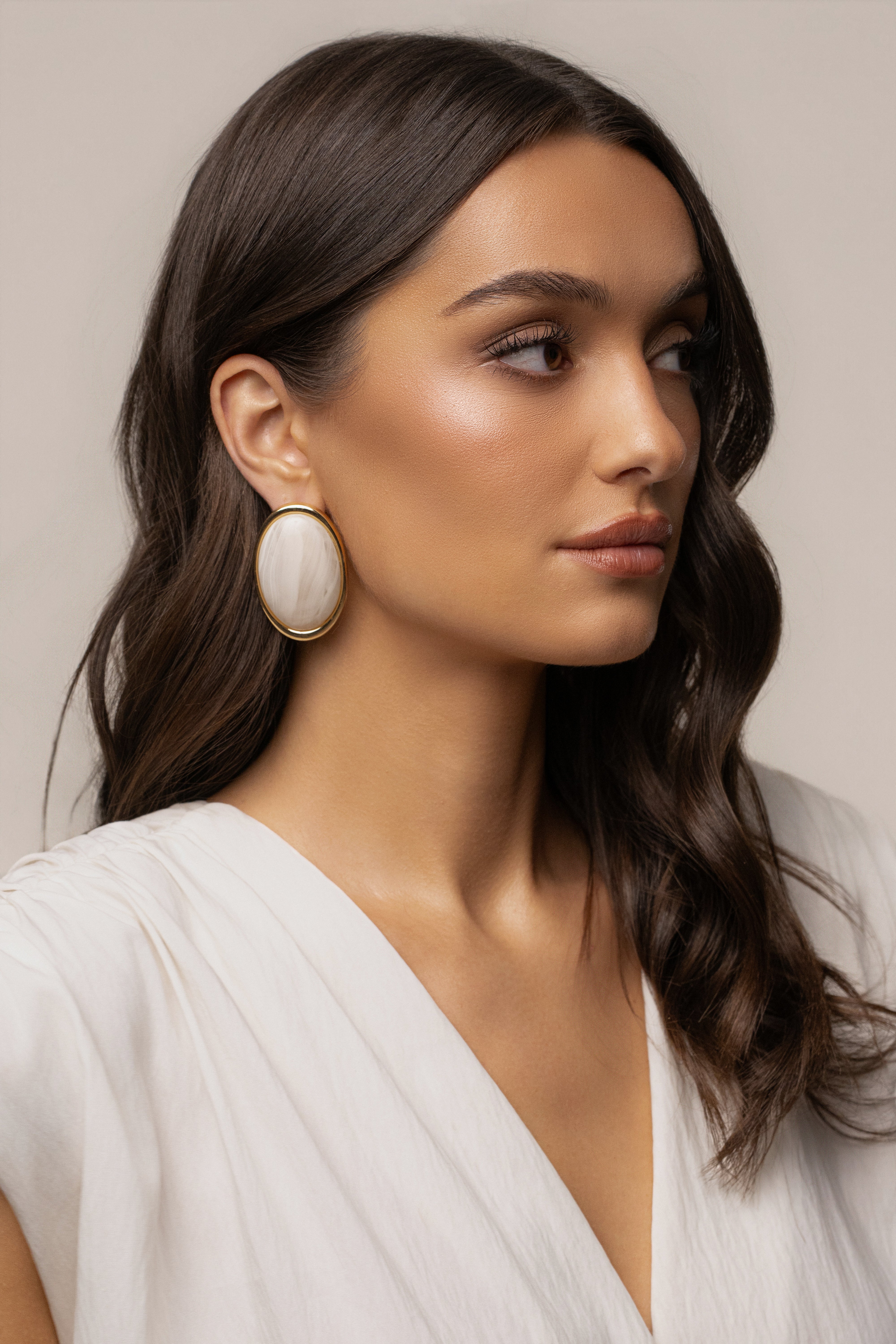 Ivory Alessia oval earrings by JLUXLABEL, elegant jewelry featuring smooth oval shape and polished finish.