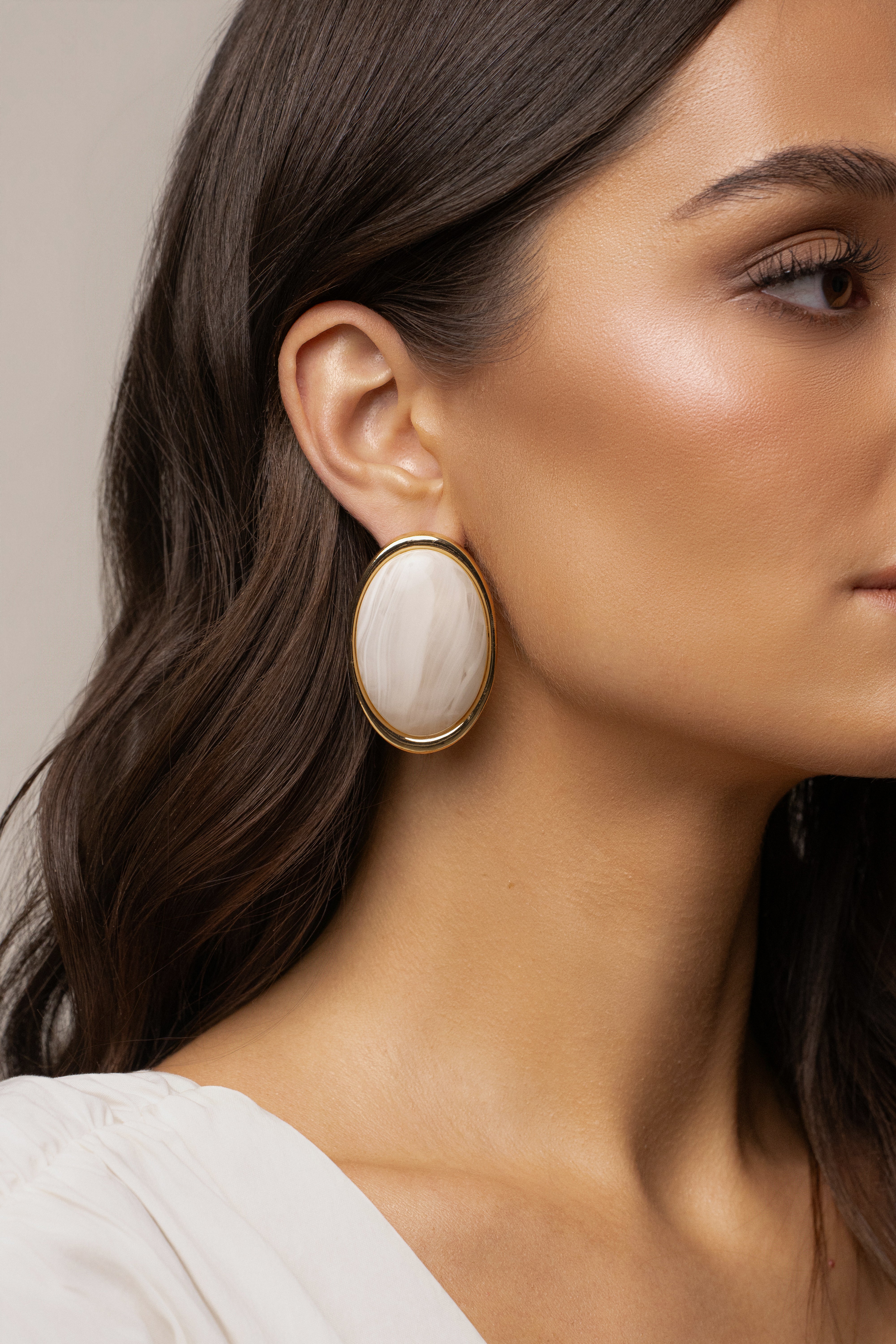 Ivory Alessia oval earrings by JLUXLABEL, elegant jewelry with smooth oval design and gold-tone accents.