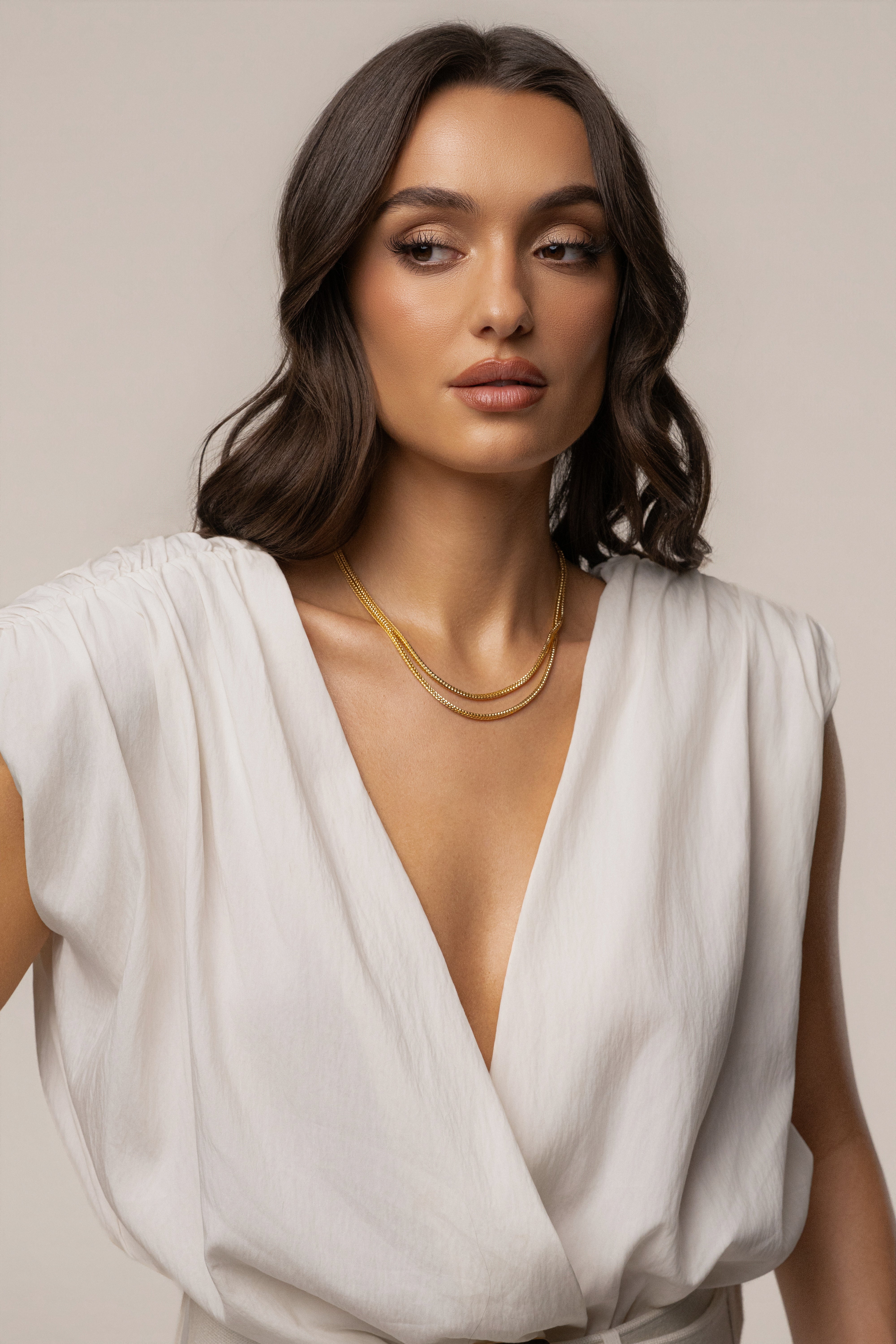 Gold double herringbone necklace from JLUXLABEL showcasing sleek, layered jewelry with a polished finish.