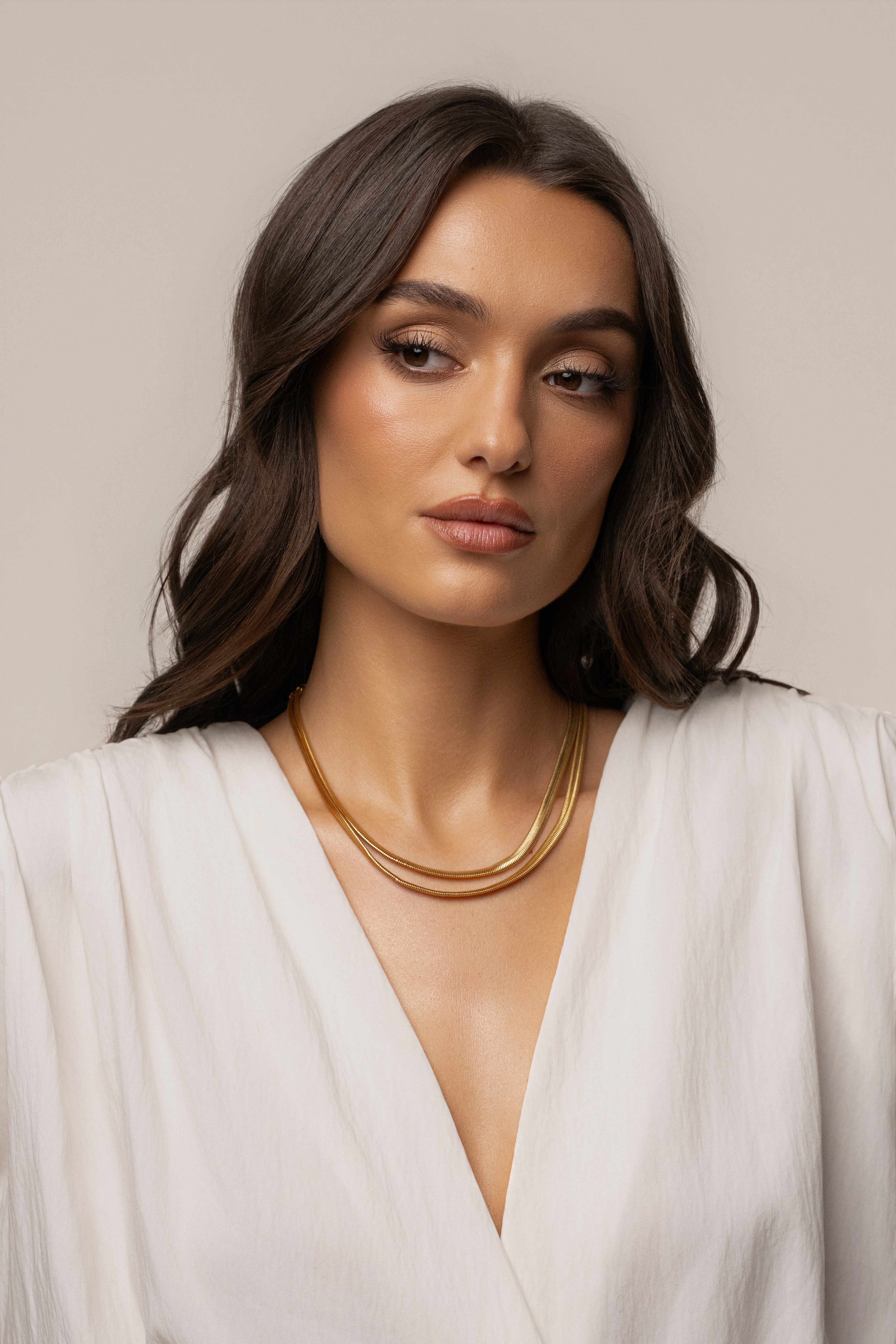 Gold Dynasty layered necklace from JLUXLABEL featuring multiple chain styles and a polished gold finish.