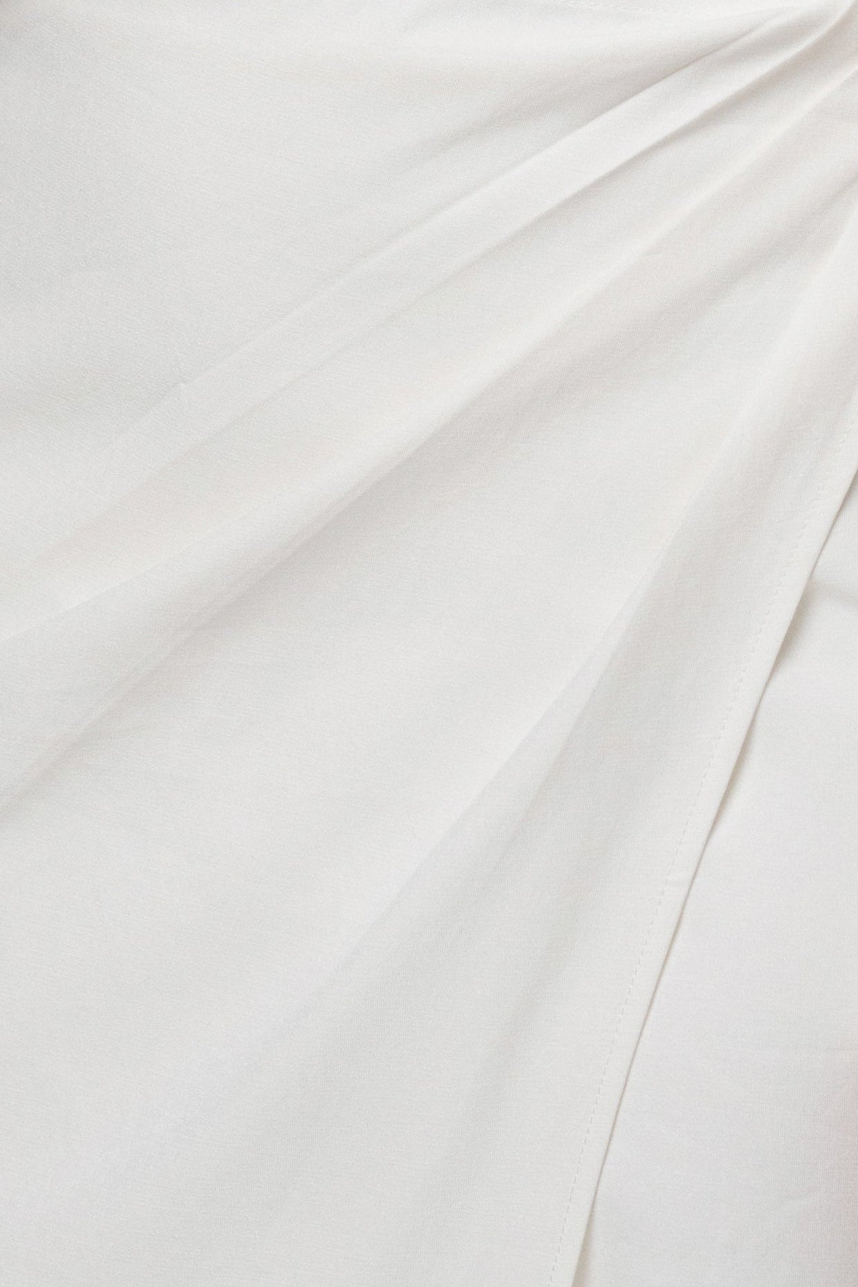 Ivory Skyline Wrap Midi Dress by JLUXLABEL, featuring a stylish wrap design and midi length, shown on a model.