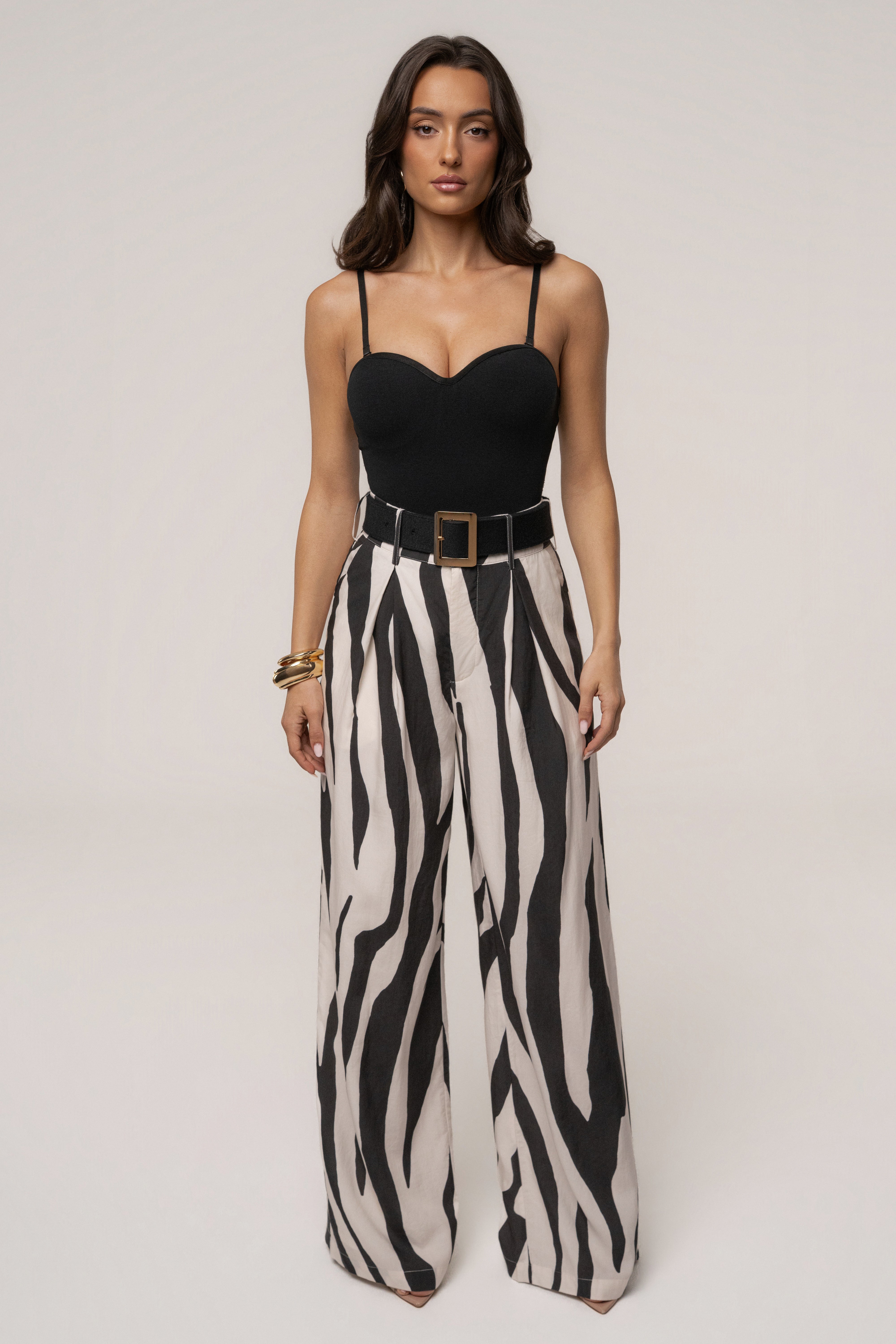 JLUXLABEL Zebra Prime Trouser bottoms, stylish black and white striped design, tailored fit, perfect for modern fashion.