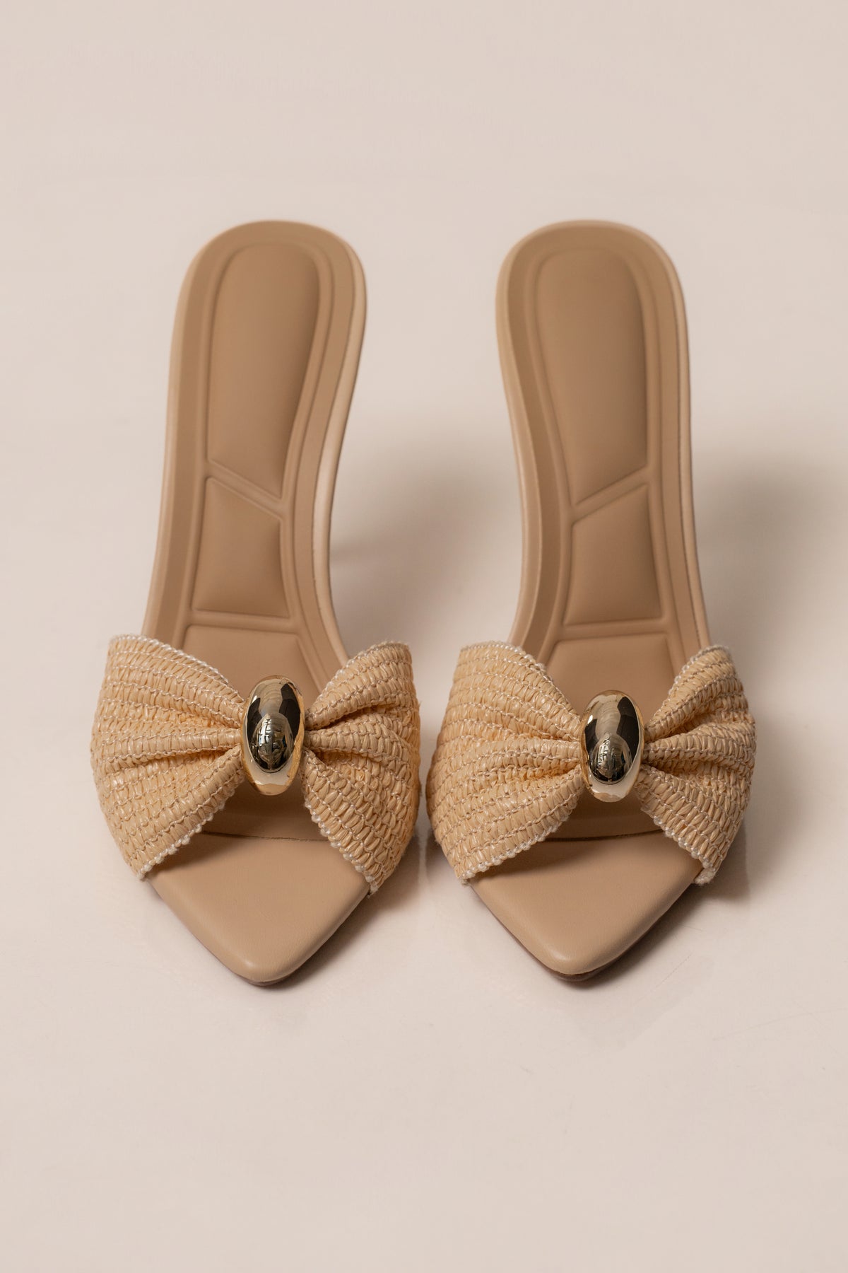Natural Boardwalk Heel accessory by JLUXLABEL featuring a stylish, neutral-toned heel with intricate design details.