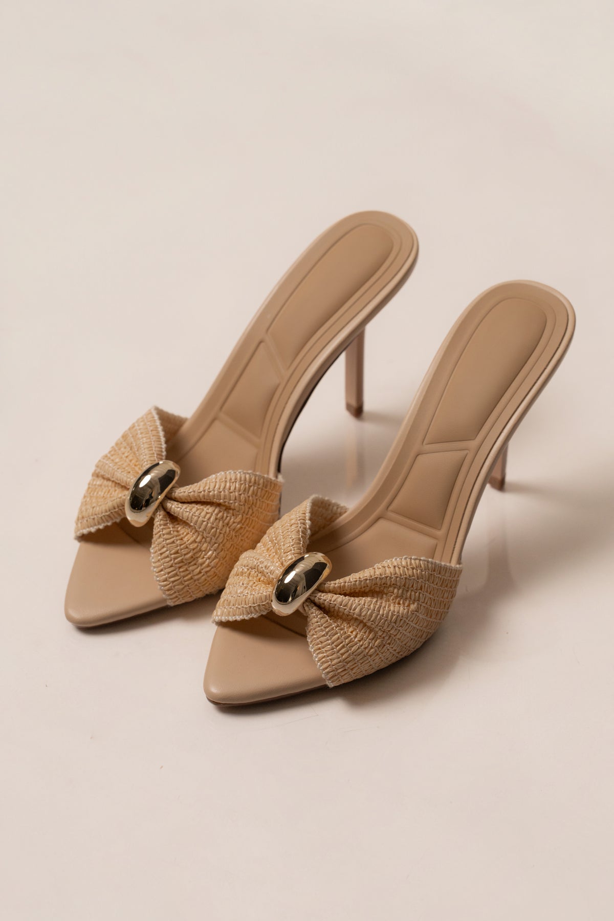 Natural Boardwalk heel accessory by JLUXLABEL featuring stylish, minimalist design with neutral tones and textured material.