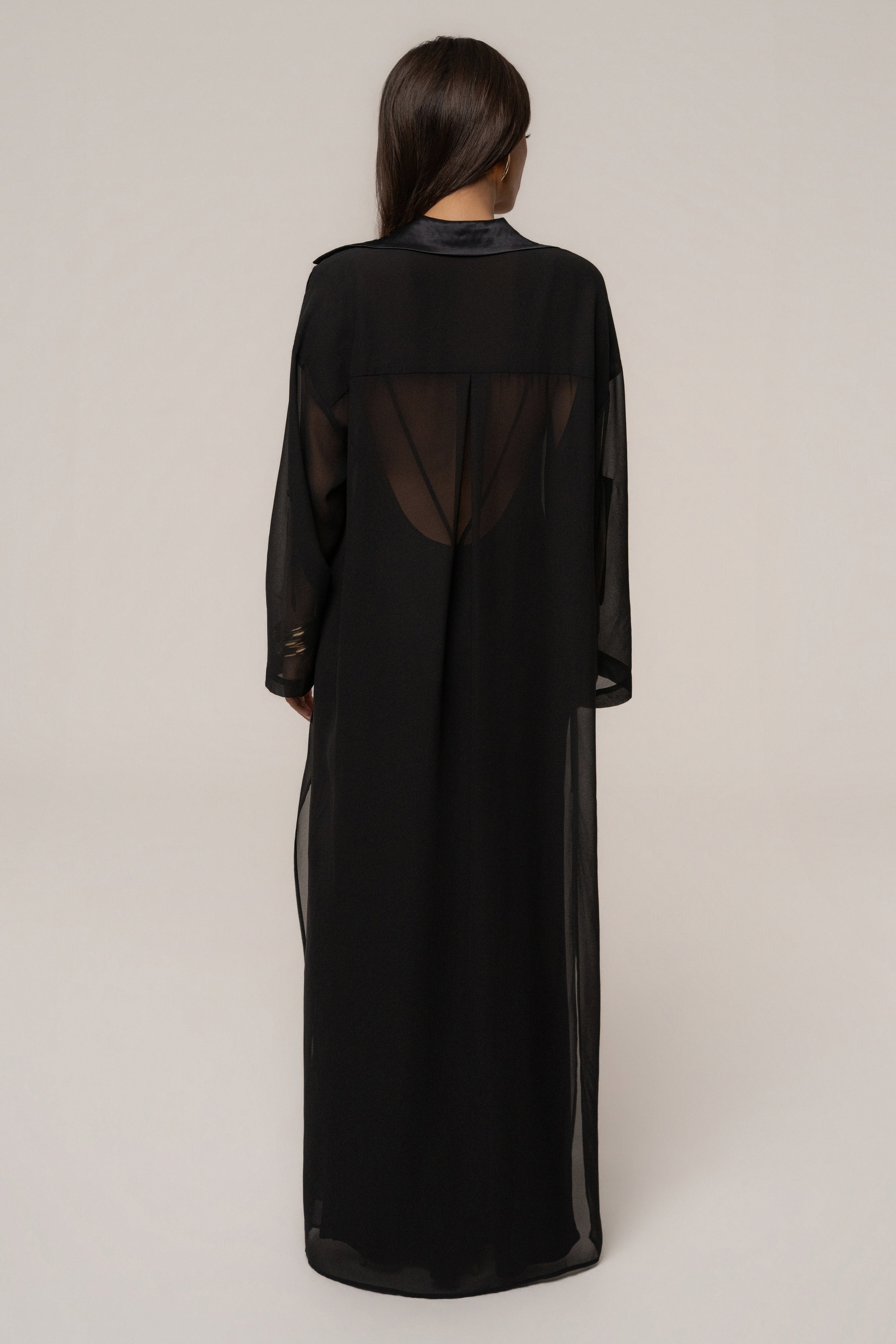 Black Ocean Breeze Cover Up dress by JLUXLABEL, flowing lightweight fabric with ocean-inspired design, perfect for beachwear.