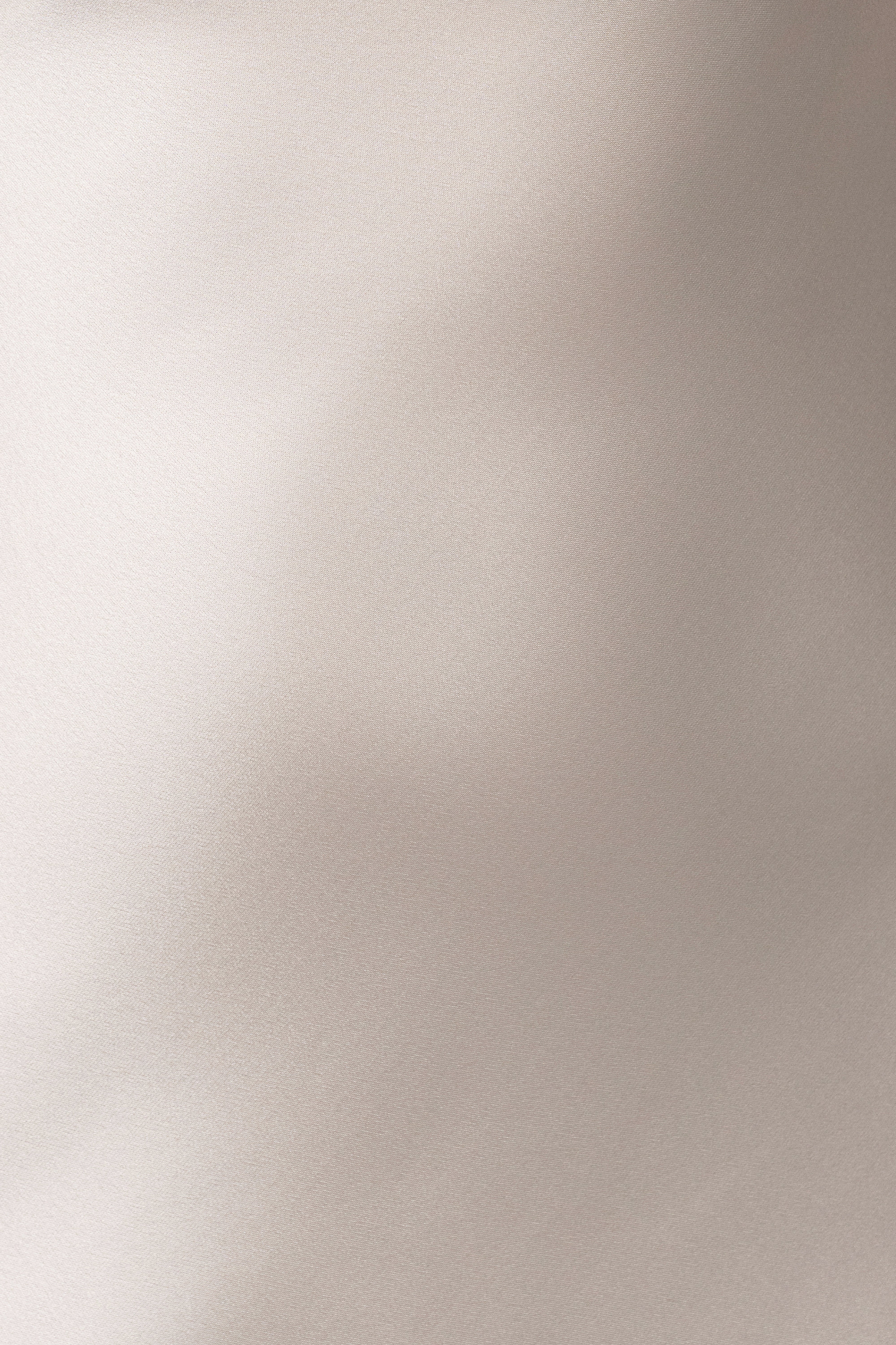 Cream Galilea Satin Maxi Dress by JLUXLABEL, showcasing a flowing satin fabric with elegant straps and a relaxed silhouette.