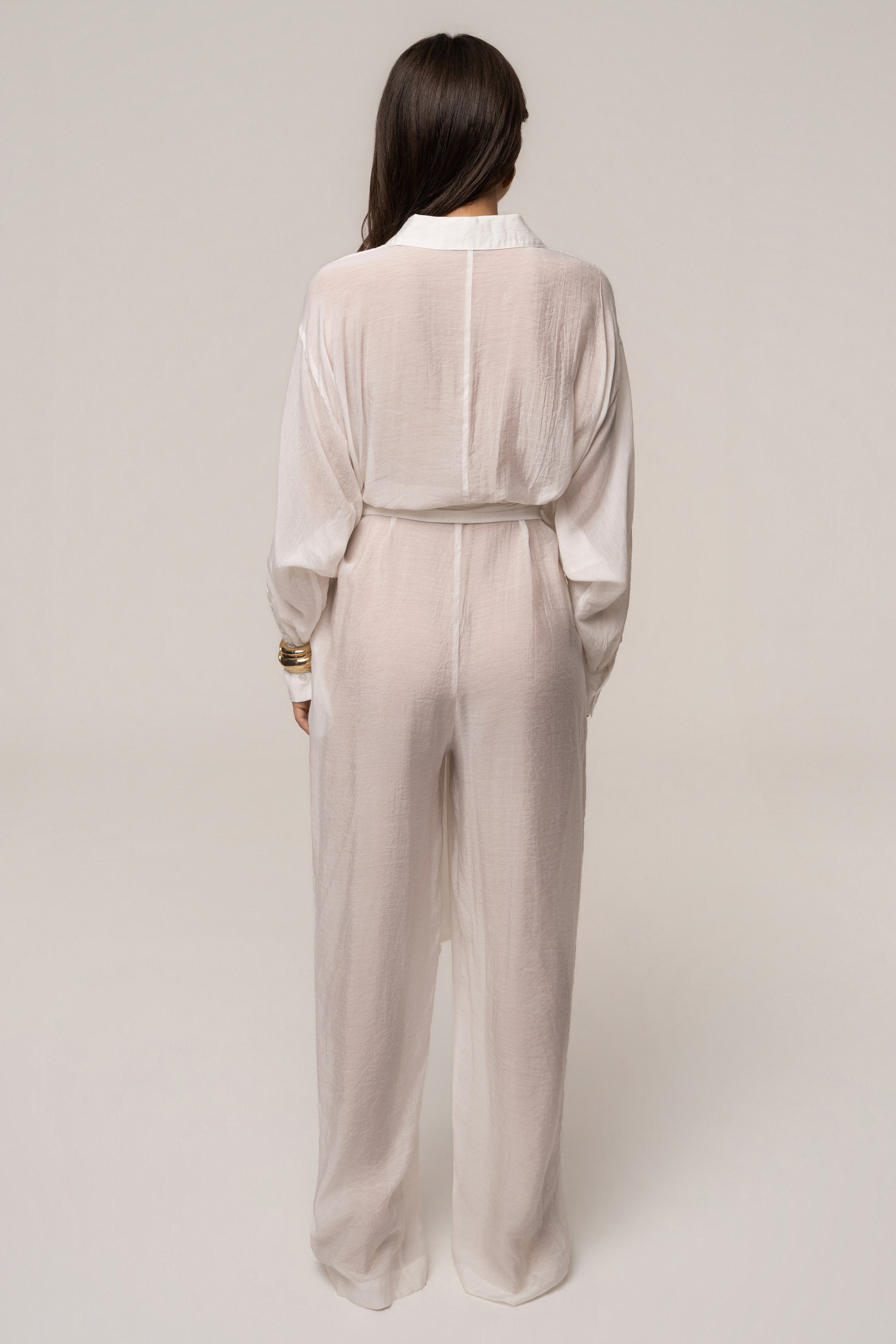 Ivory JLUXLABEL Soho tailored jumpsuit with wide legs and sleeveless design, perfect for stylish casual or semi-formal wear.