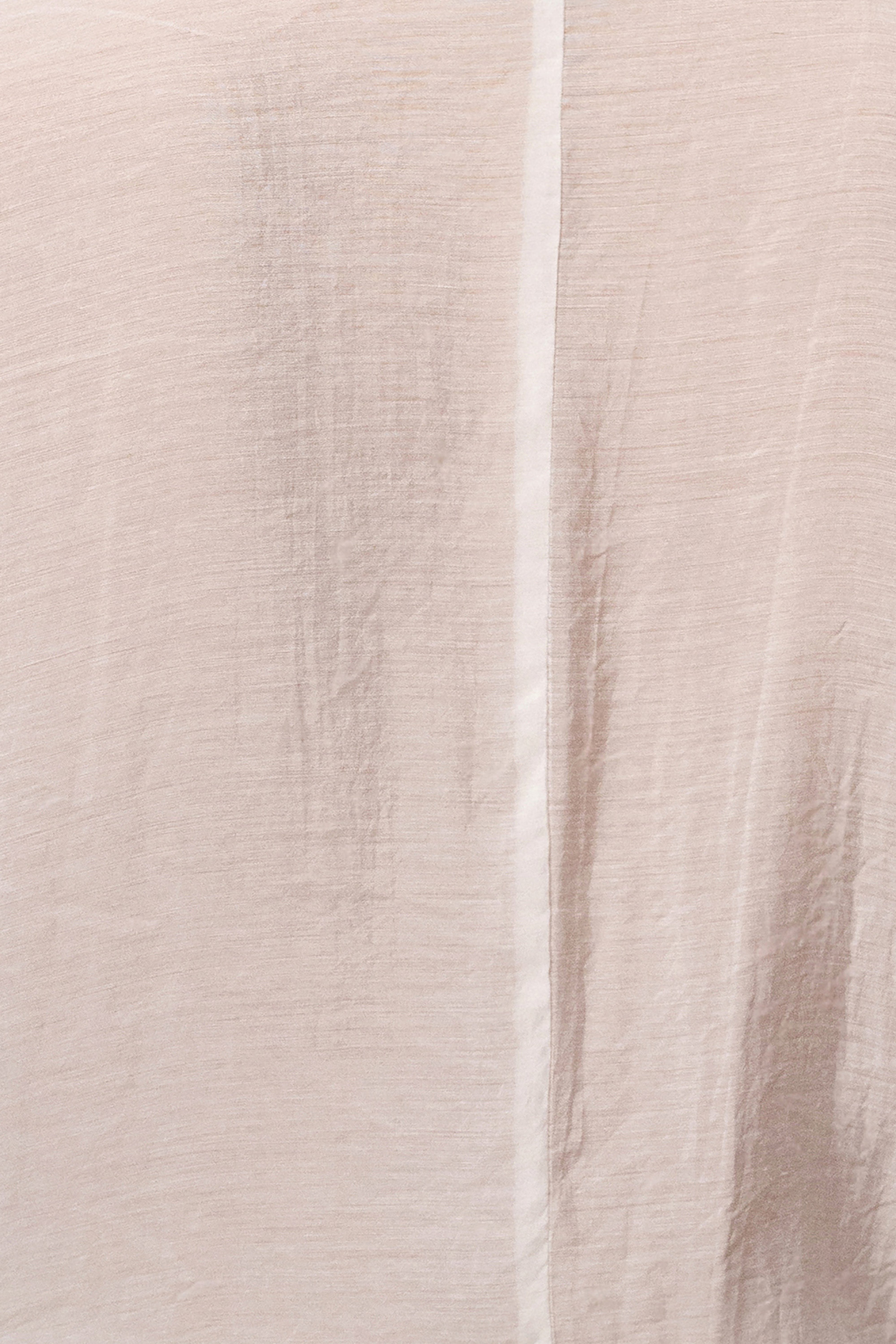 Ivory JLUXLABEL Soho tailored jumpsuit with wide legs and a fitted bodice, displayed on a mannequin.