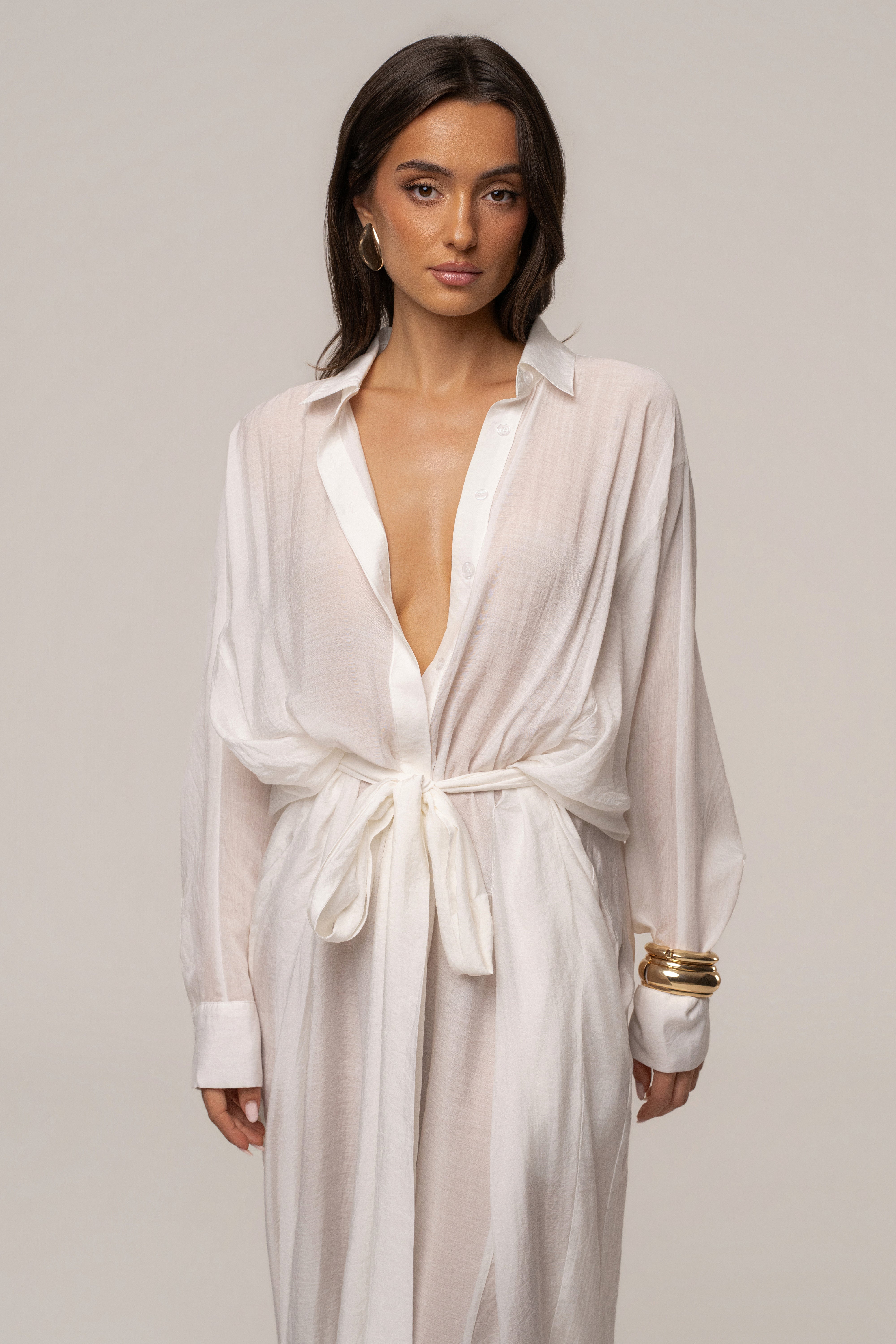 Ivory JLUXLABEL Soho tailored jumpsuit with wide-leg pants and sleeveless design, stylish and elegant for versatile wear.