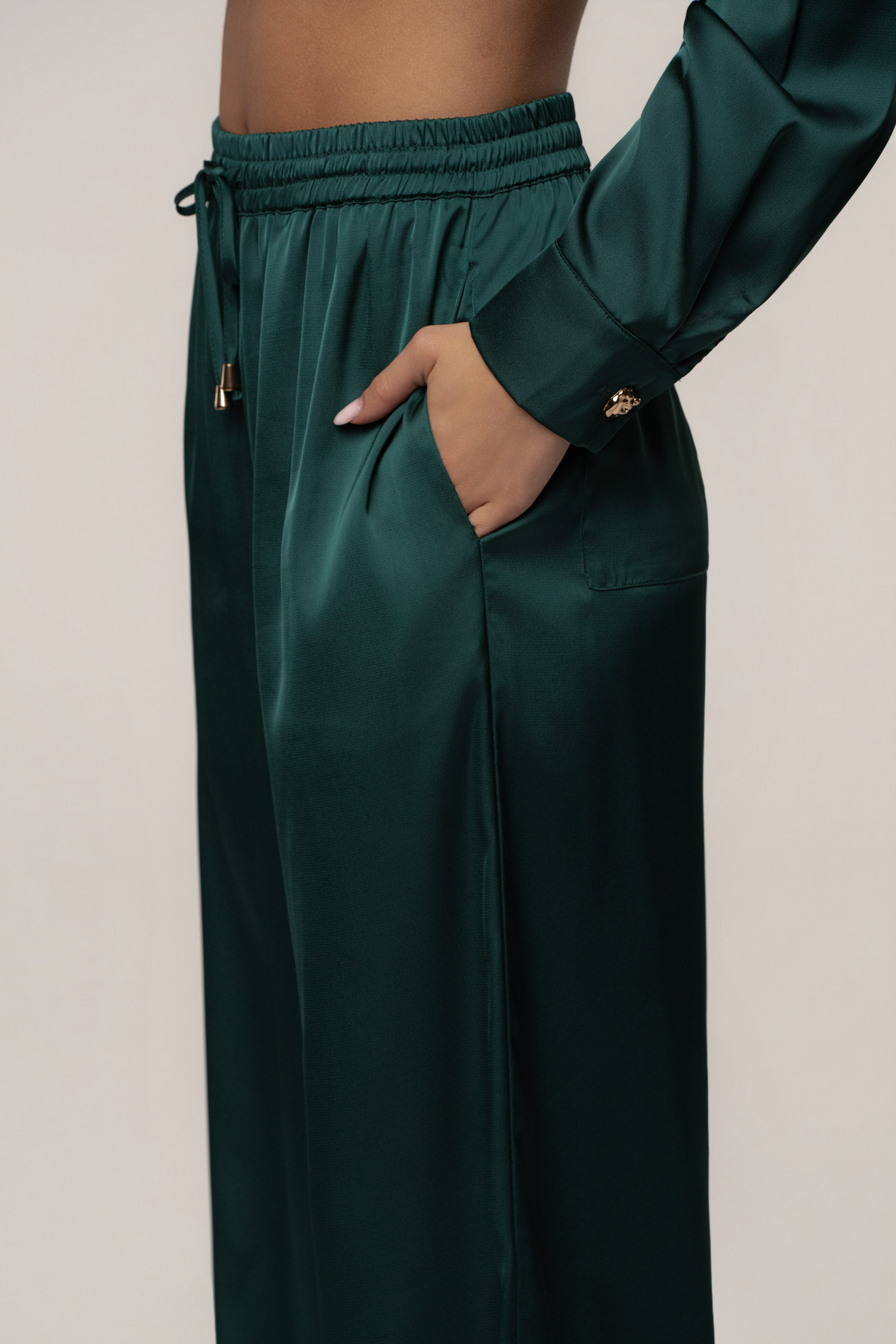 Emerald green JLUXLABEL Sunny Day drawstring pants, casual bottoms with relaxed fit and adjustable waistband.