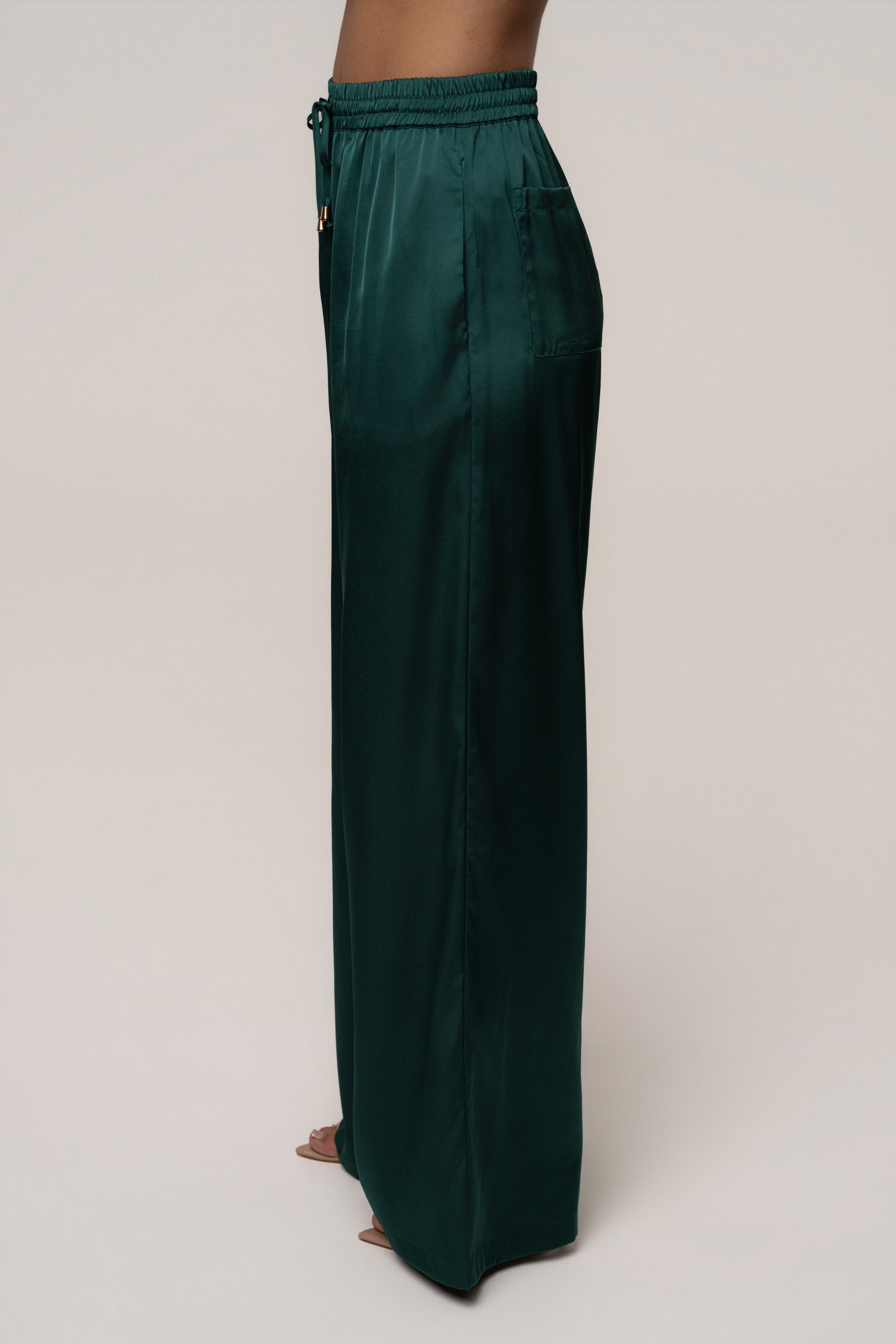 Emerald green JLUXLABEL Sunny Day drawstring pants, casual bottoms with adjustable waist and relaxed fit.