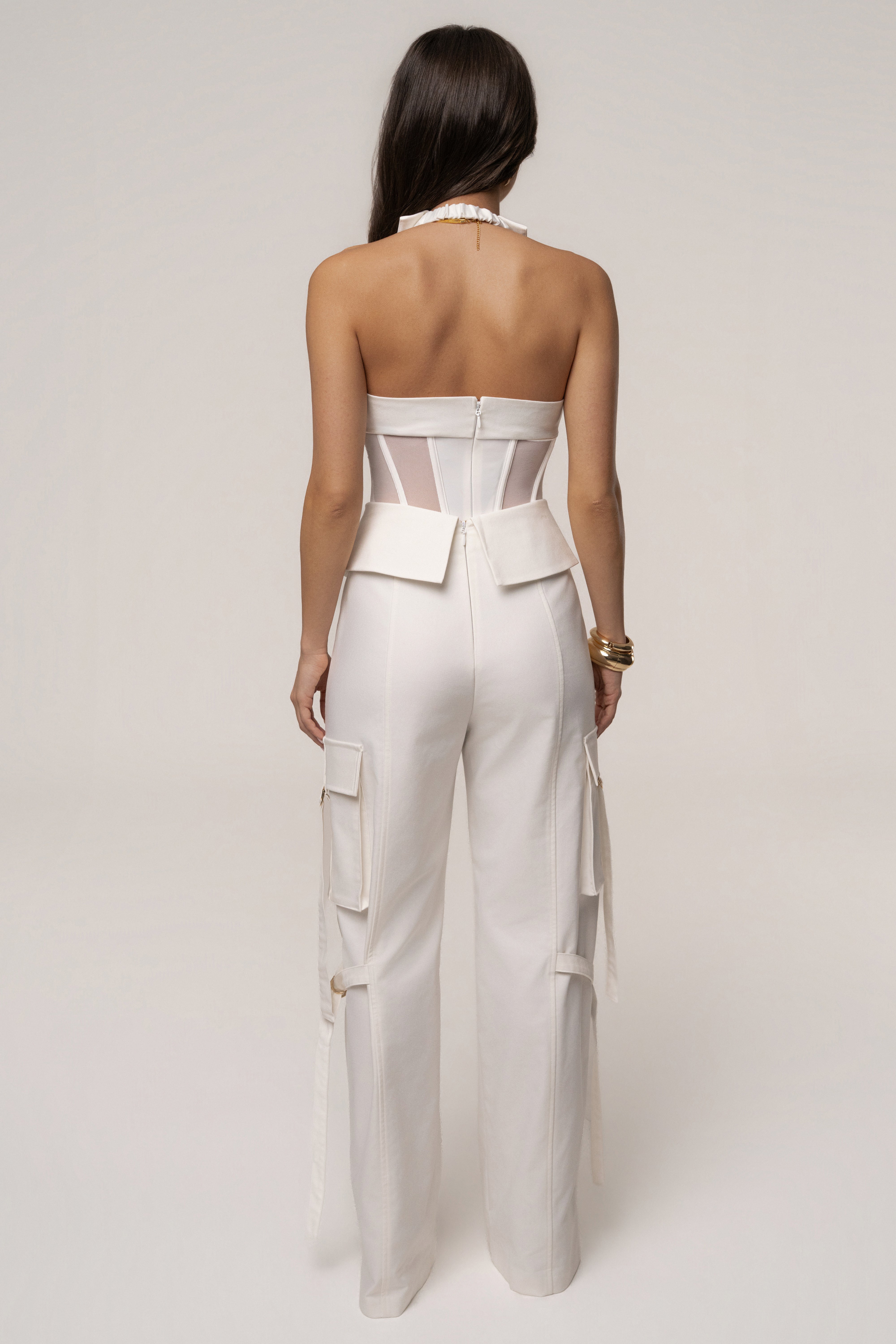 JLUXLABEL Cream Downtown Cargo Pants shown in a relaxed fit with multiple cargo pockets and a comfortable waistband.