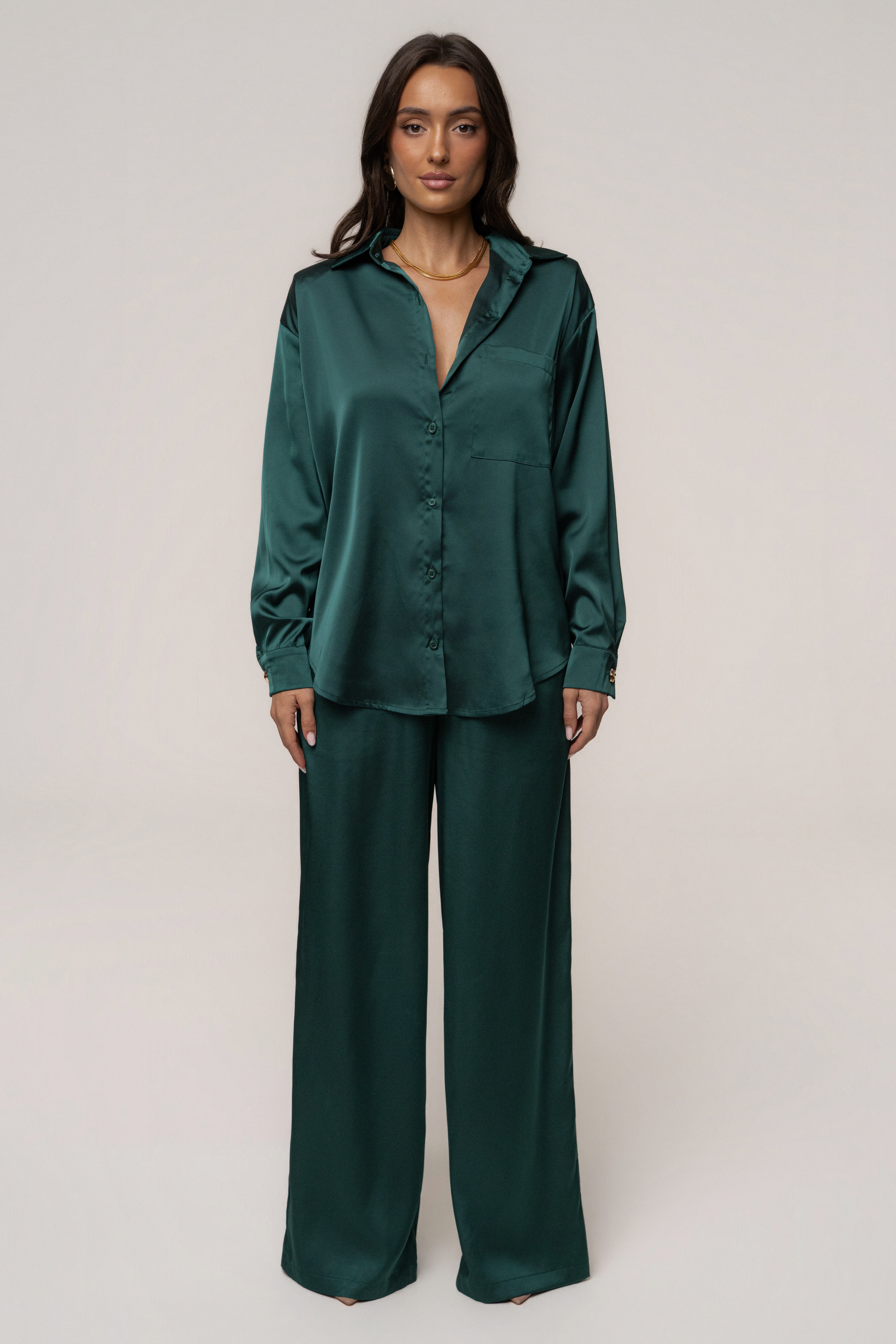 Emerald green satin collared top from JLUXLABEL with a relaxed fit, featuring a smooth, shiny fabric and stylish collar detail.