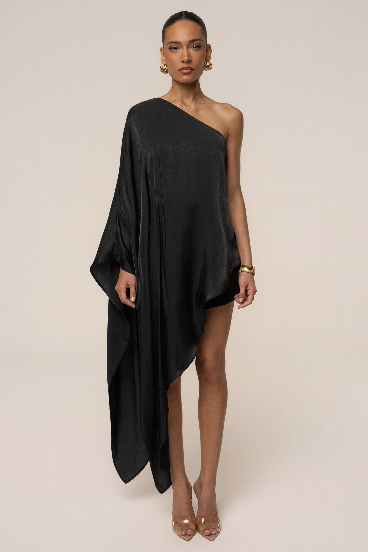 Black Cher iridescent top by JLUXLABEL, featuring shimmering fabric and stylish design, shown on a model.