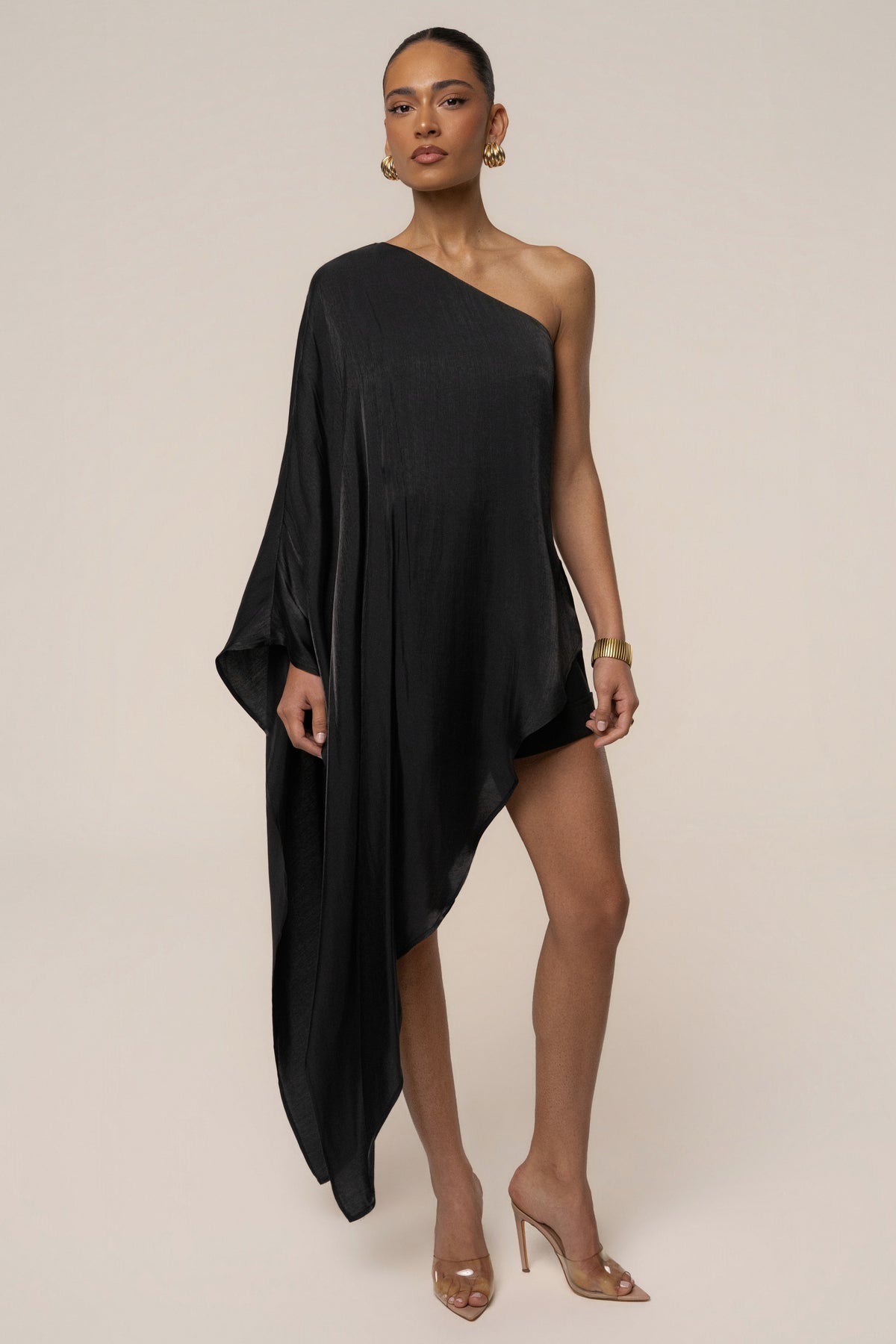 Black Cher iridescent top from JLUXLABEL, showcasing a stylish, shiny fabric with a fitted silhouette and sleeveless design.