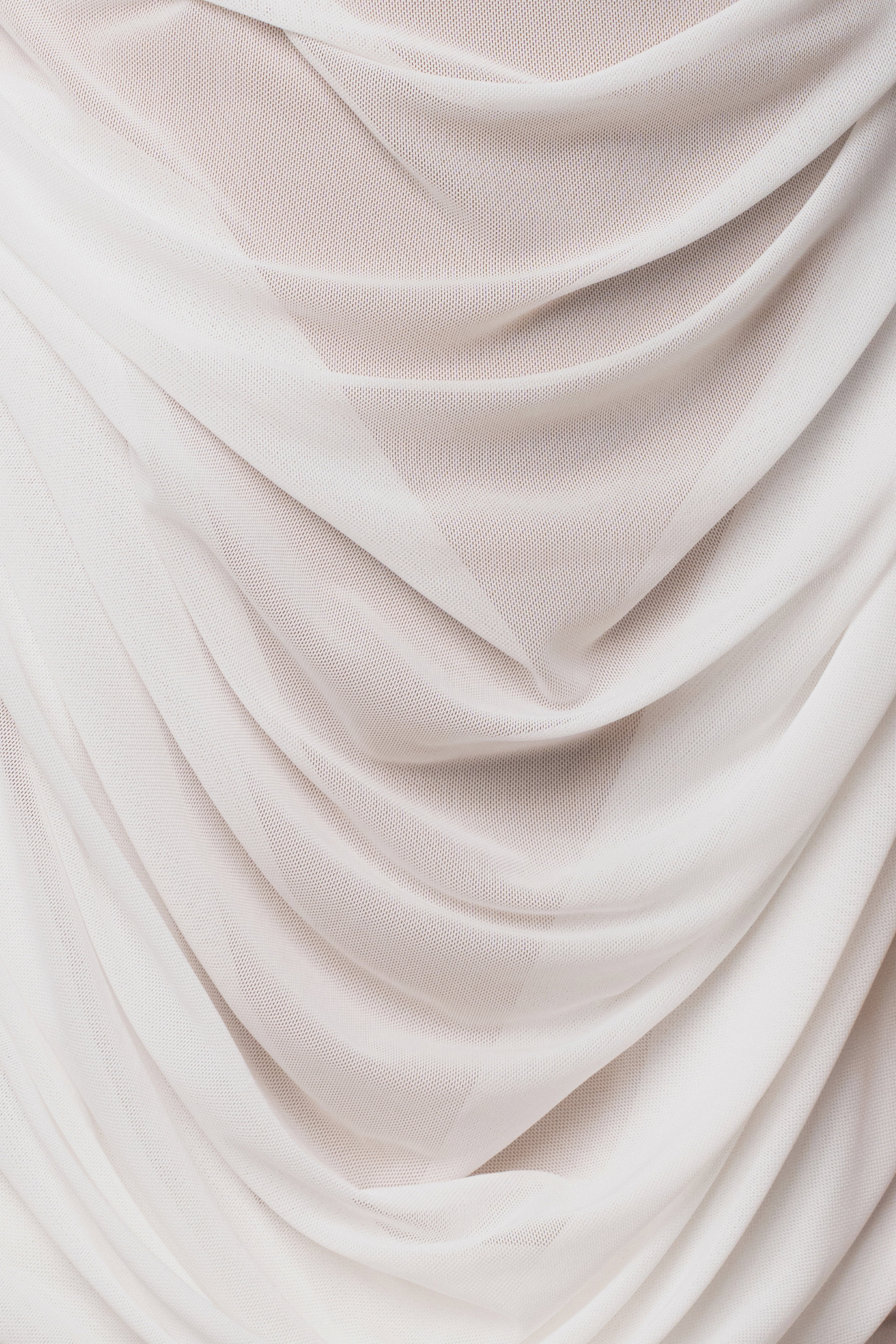 Ivory Isla Mesh Mini Dress by JLUXLABEL, featuring a fitted silhouette, sleeveless design, and delicate mesh fabric.