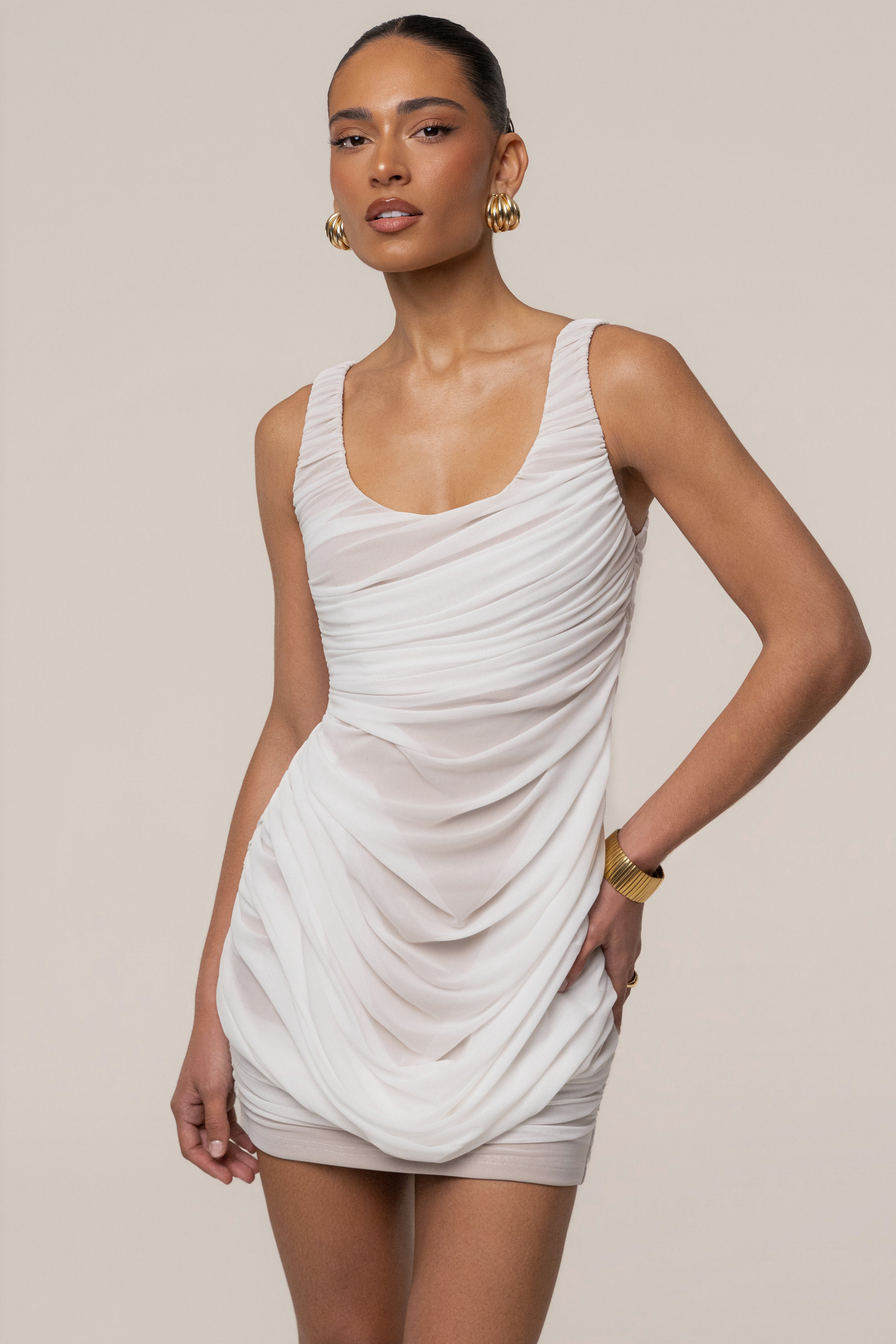 Ivory Isla Mesh Mini Dress by JLUXLABEL featuring a fitted silhouette and delicate mesh fabric, perfect for stylish occasions.