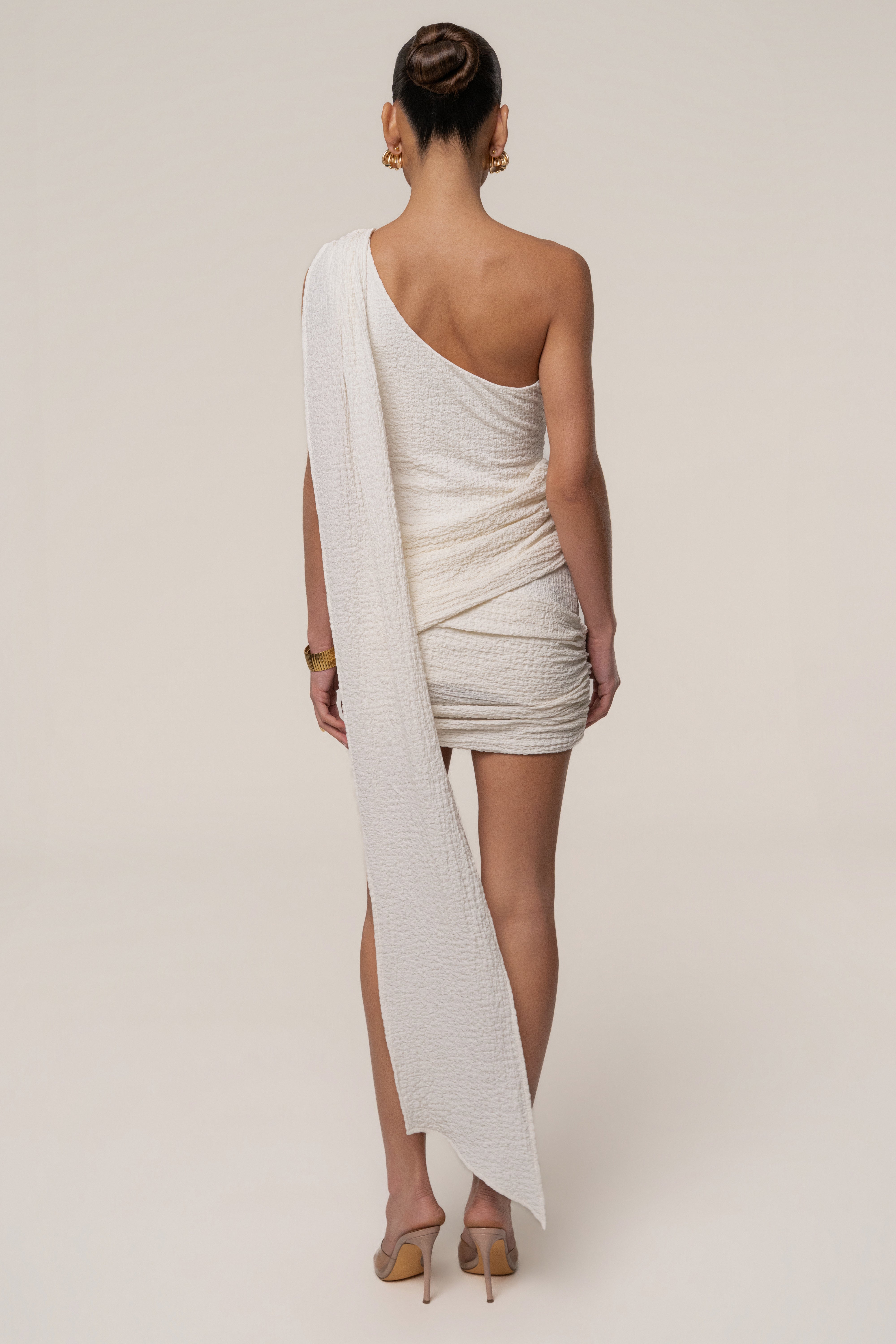 Ivory Night Muse mini dress by JLUXLABEL, sleeveless with a fitted silhouette, perfect for evening or special occasions.