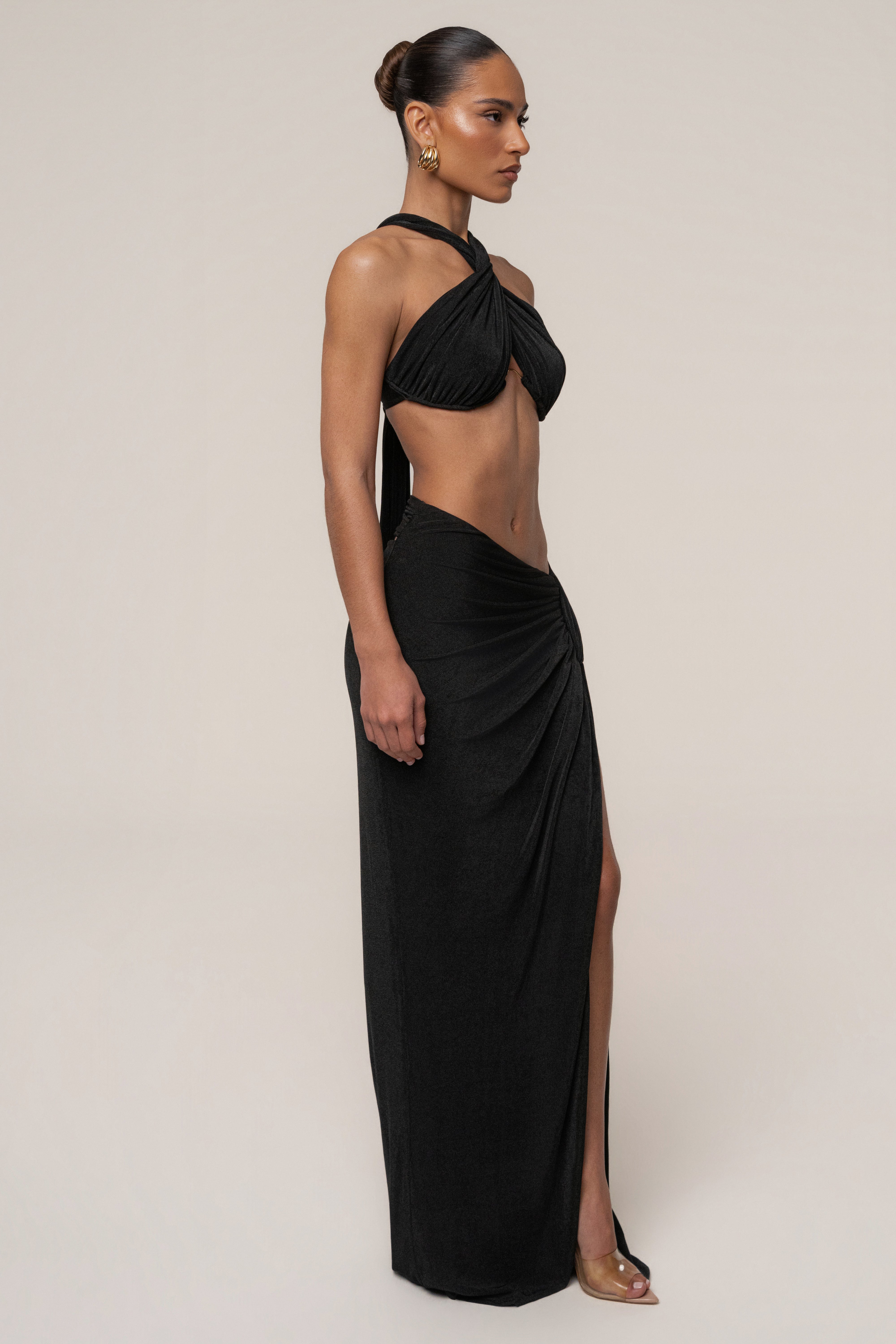Black City After Dark skirt set by JLUXLABEL featuring a stylish matching top and skirt ensemble for chic nighttime look.