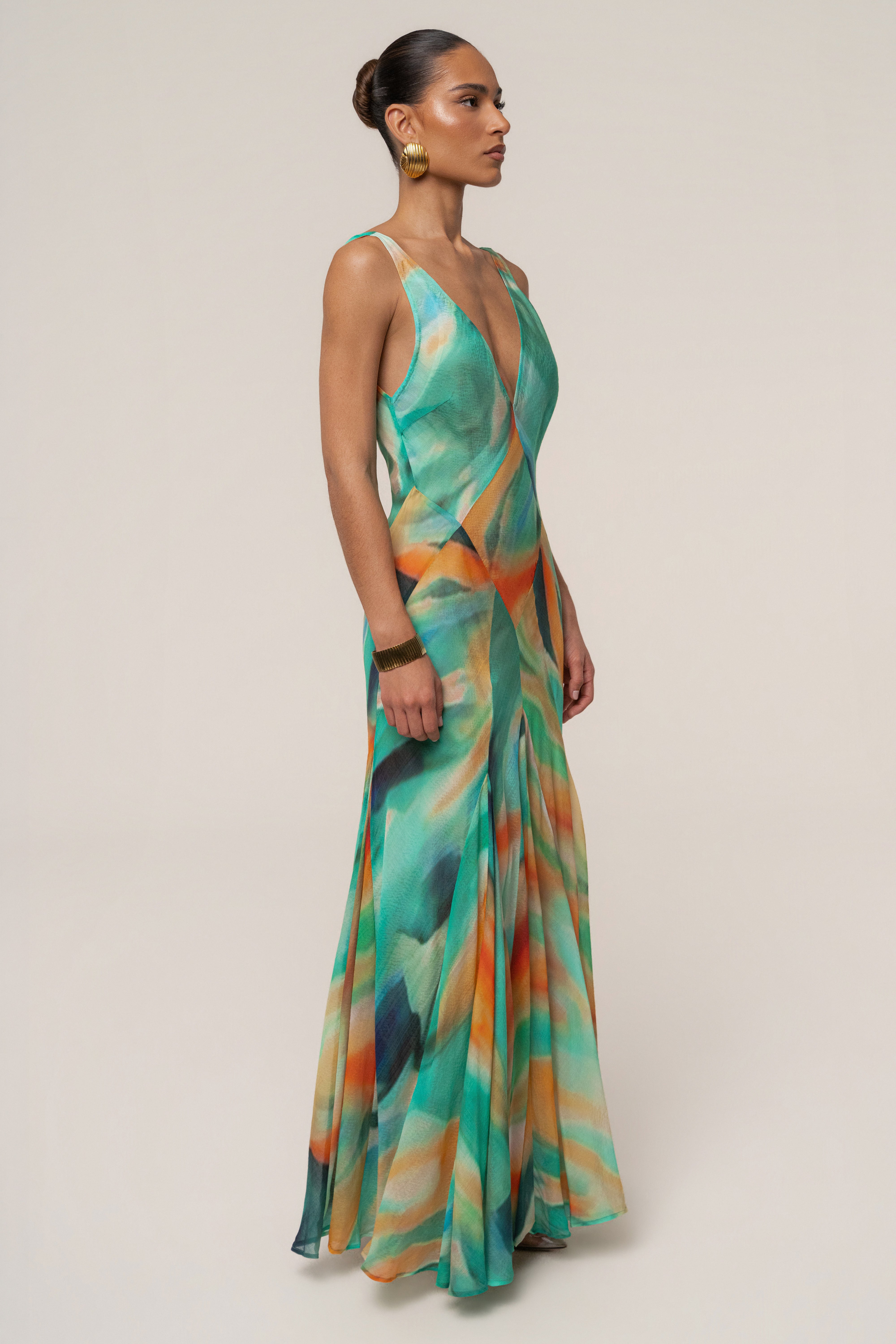 Green Prism Tide maxi dress by JLUXLABEL featuring a flowing silhouette and vibrant color, perfect for elegant summer occasions.