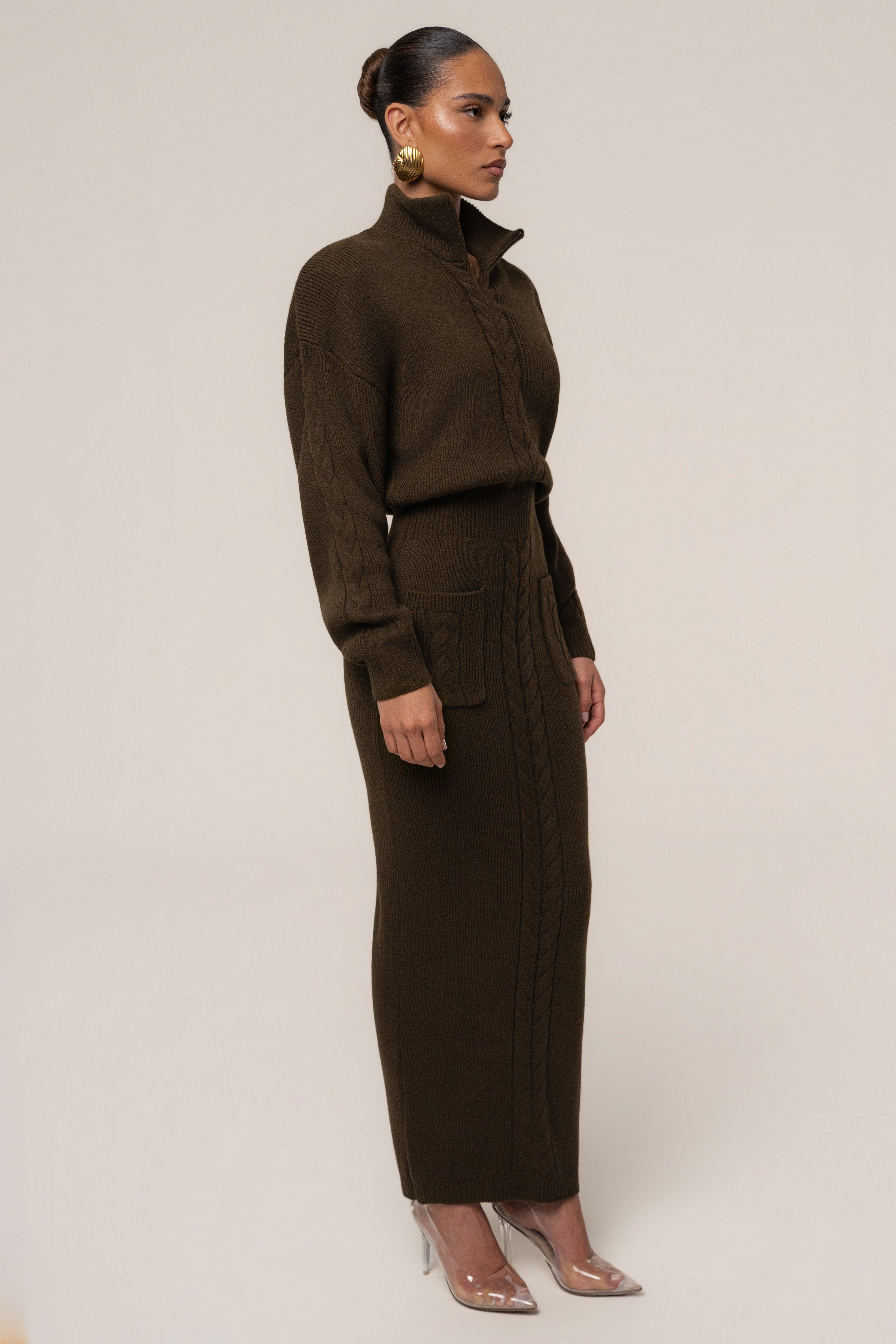 Chocolate ribbed dress by JLUXLABEL featuring cozy, form-fitting design with long sleeves and a stylish silhouette.