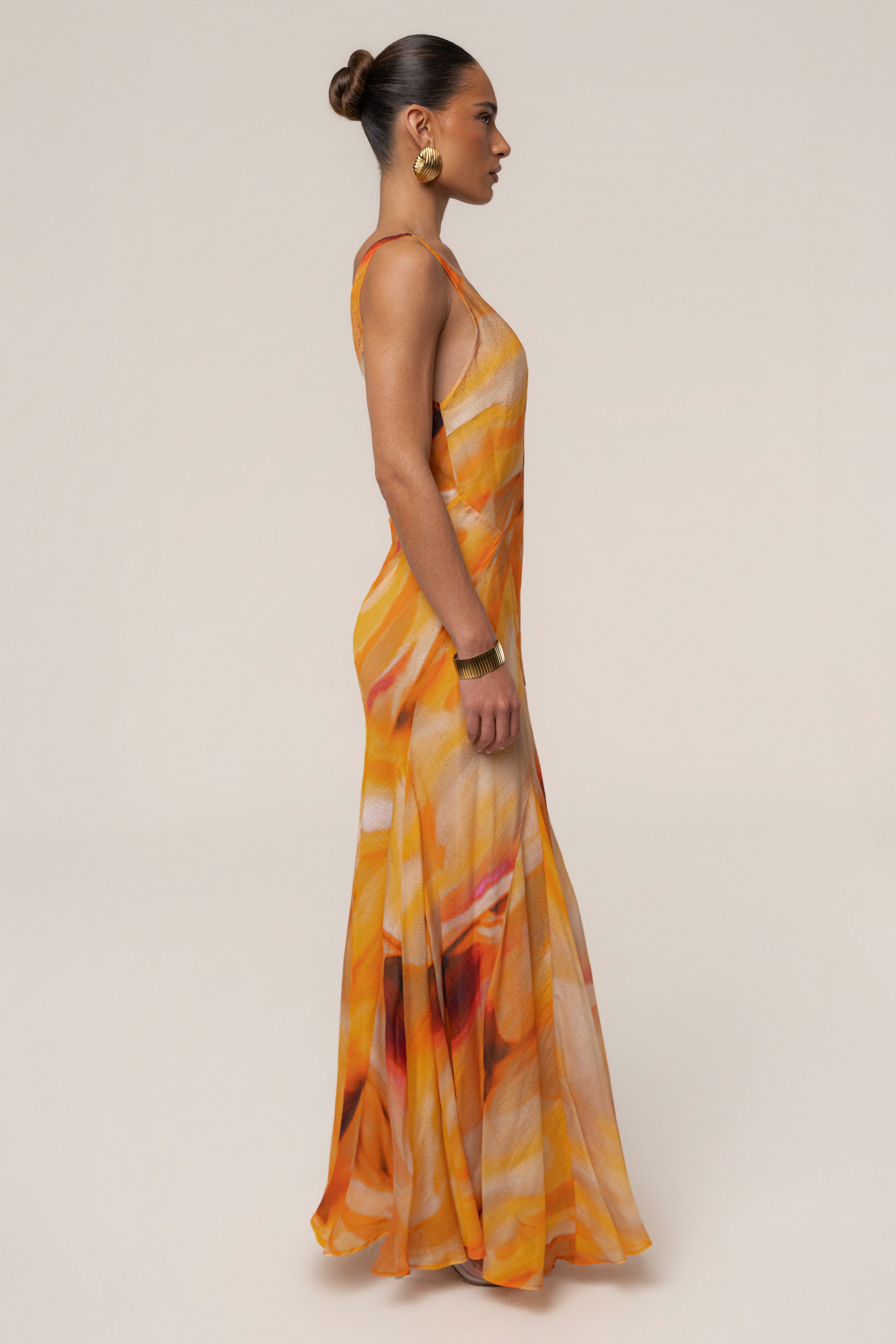 Yellow Prism Tide maxi dress by JLUXLABEL featuring a flowing silhouette and vibrant color, perfect for summer occasions.