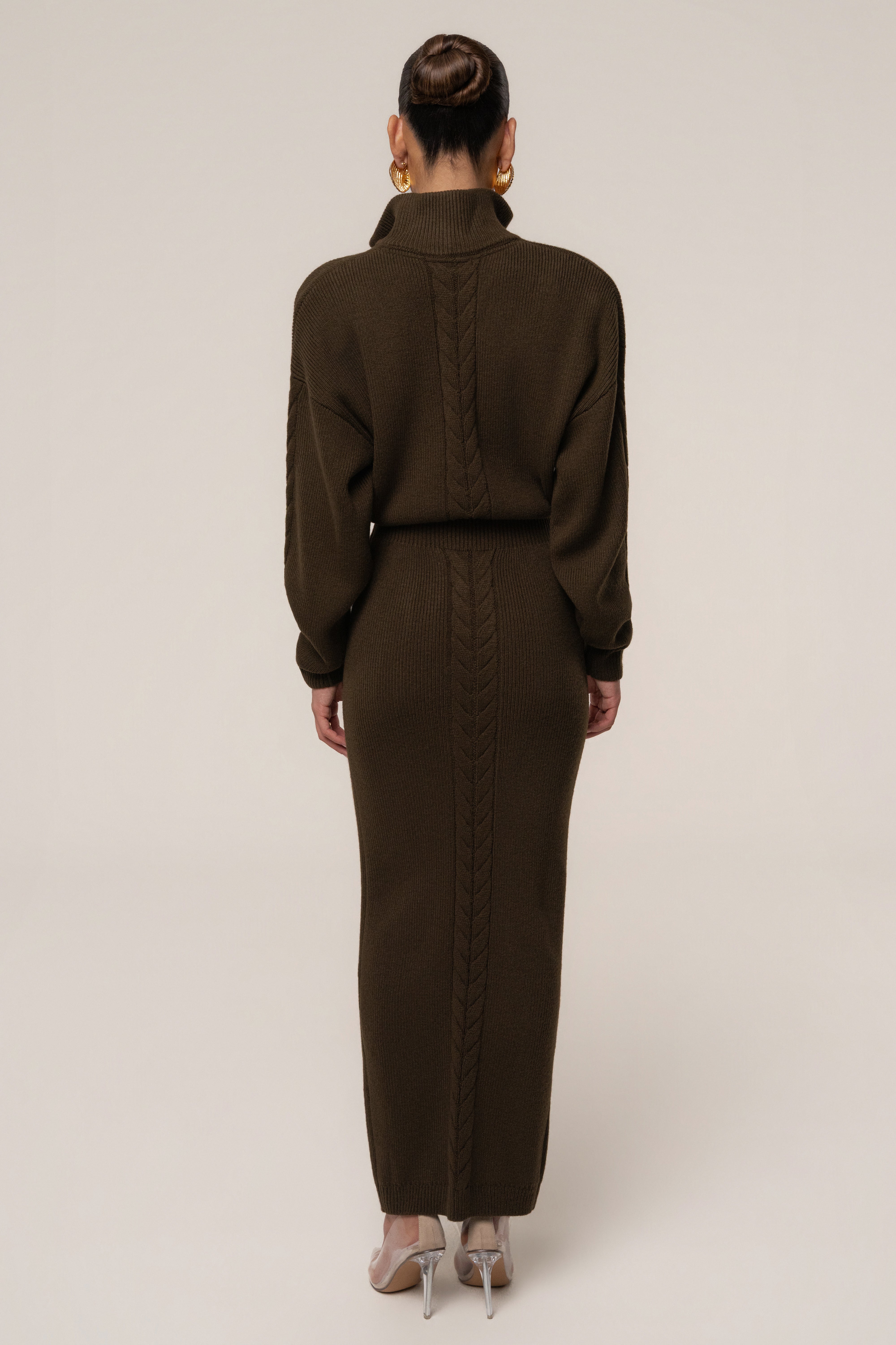 Chocolate ribbed dress by JLUXLABEL featuring a cozy, fitted design perfect for casual or stylish occasions.