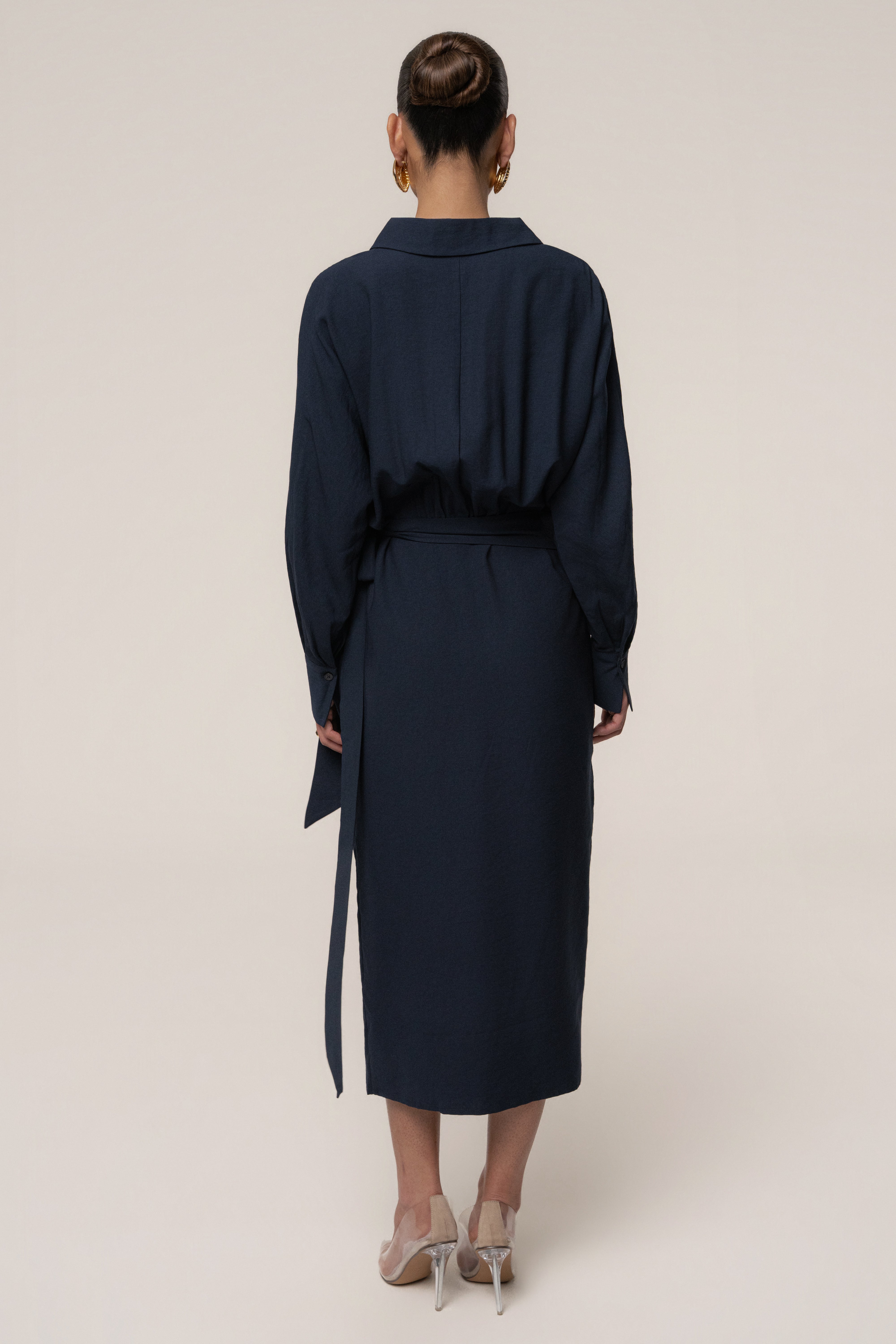 Navy Skyline Wrap Midi Dress by JLUXLABEL featuring a flattering waist tie and elegant midi length, perfect for stylish occasions.