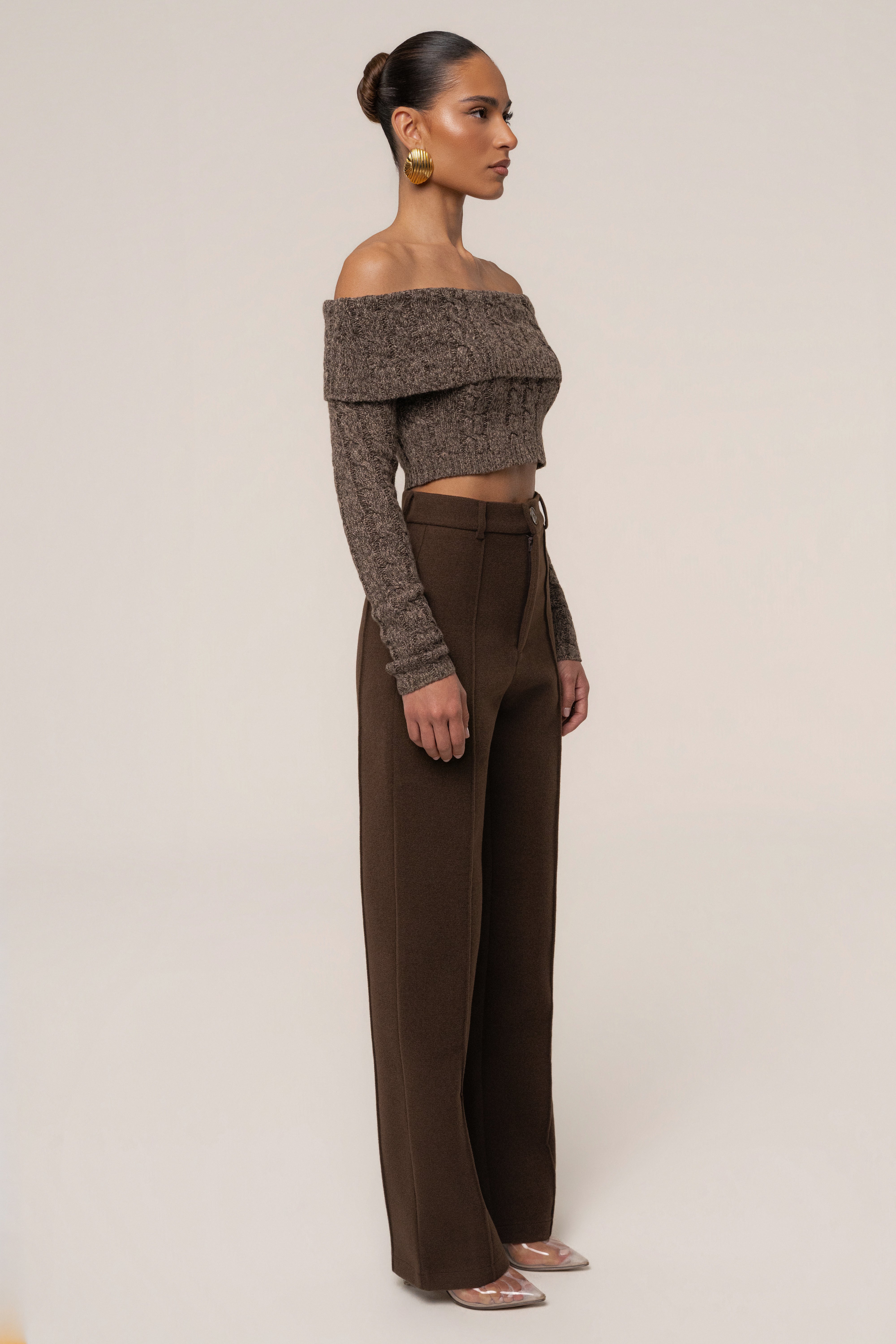 Brown JLUXLABEL Off Duty sweater top with a relaxed fit and long sleeves, styled casually on a model.
