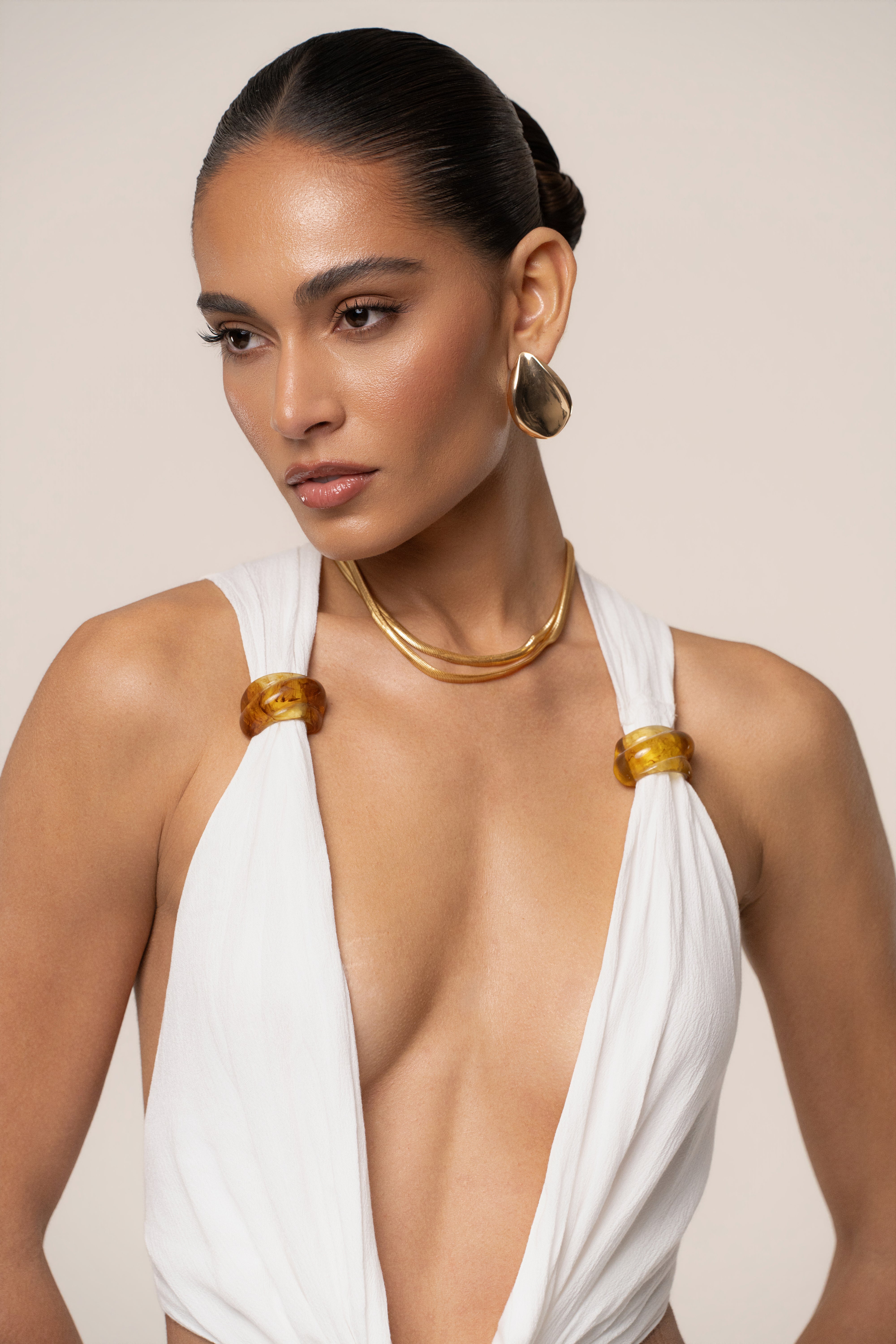 White Tulum Drape Top by JLUXLABEL featuring lightweight fabric and relaxed fit, shown on a hanger.