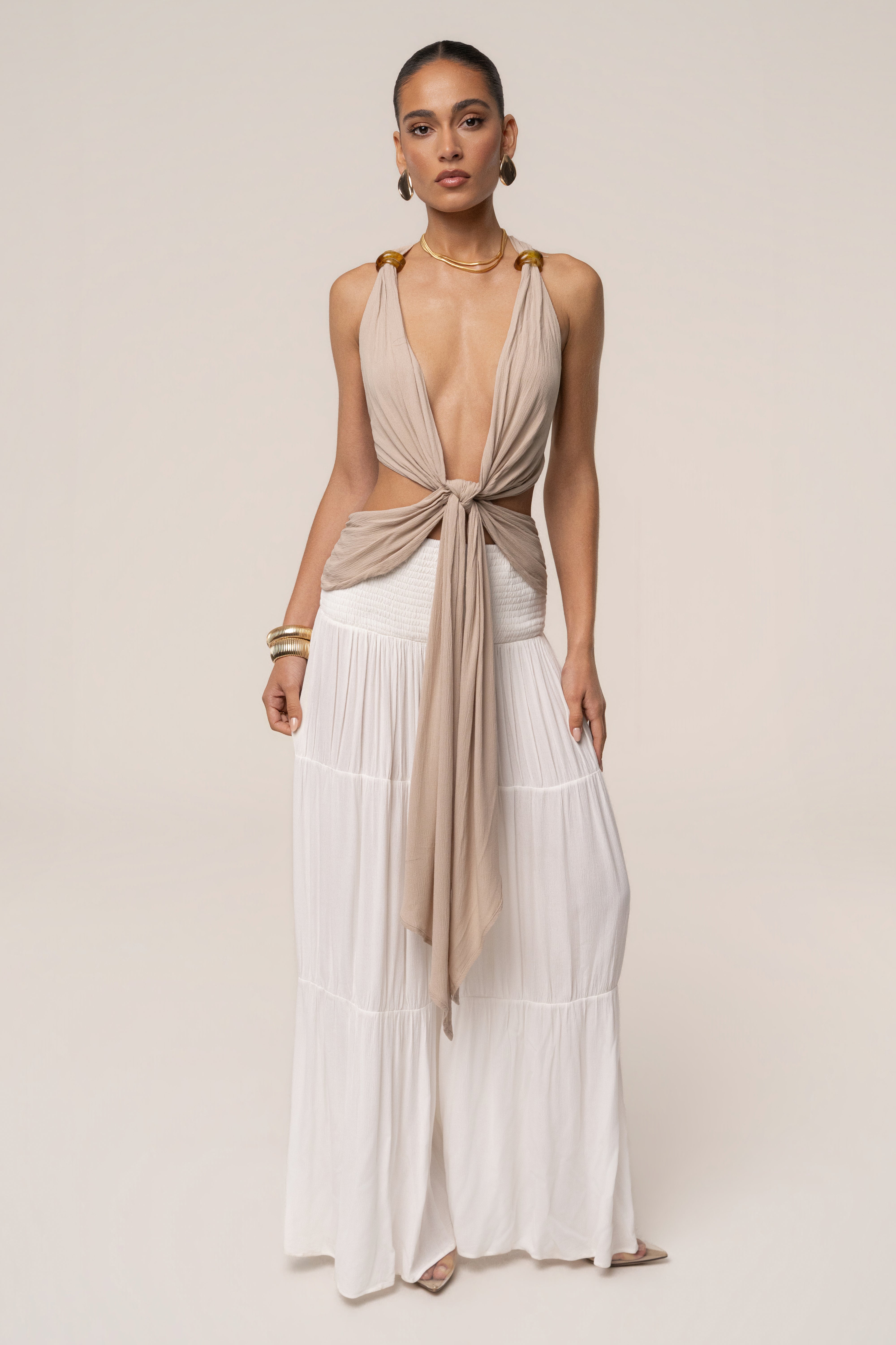 Beige Tulum Drape Top from JLUXLABEL, featuring flowing fabric and stylish draped design, perfect for casual or chic outfits.