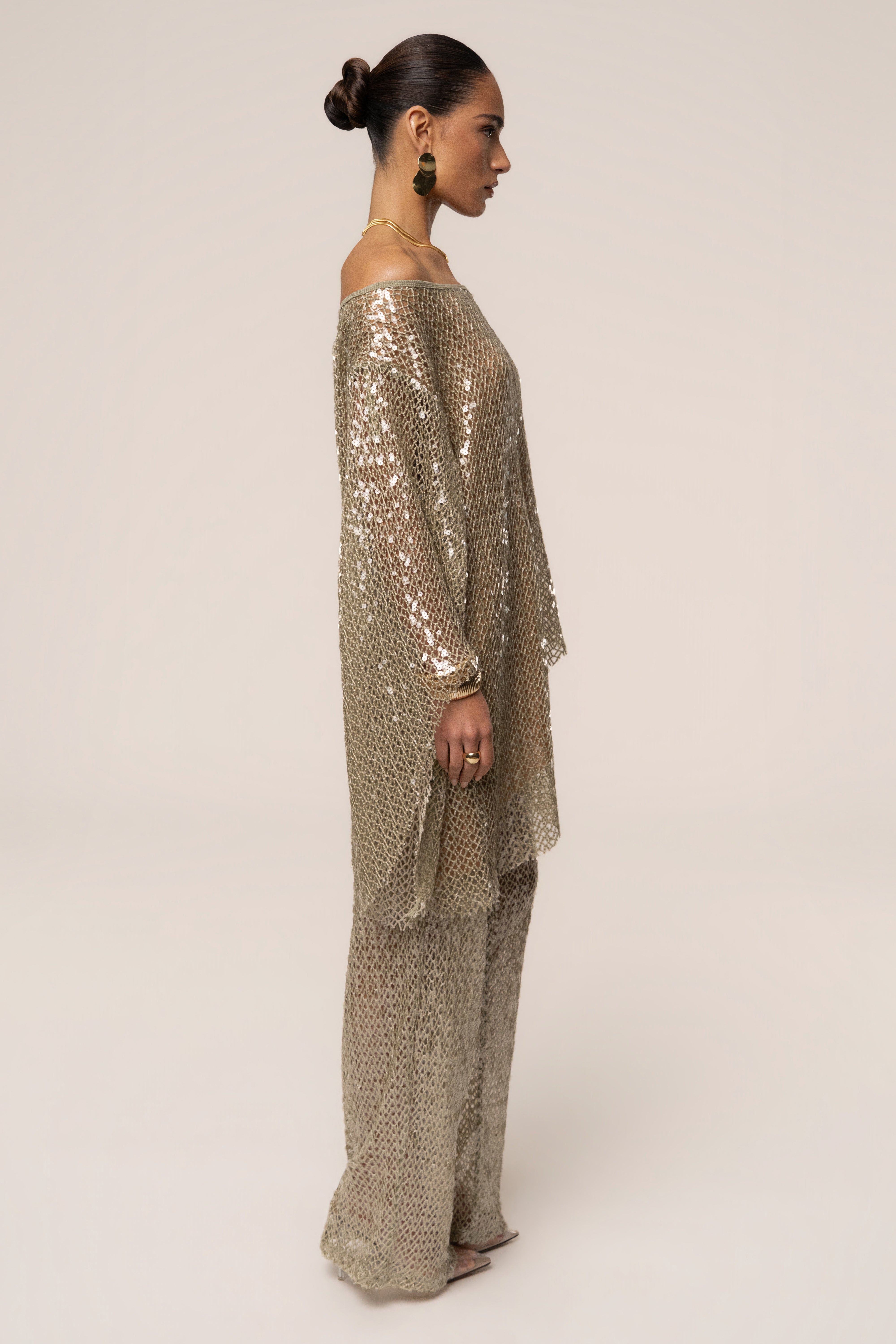 JLUXLABEL Sage Sheer Glow Sequin Top, lightweight sheer fabric with shimmering sequin details, stylish party-ready top.