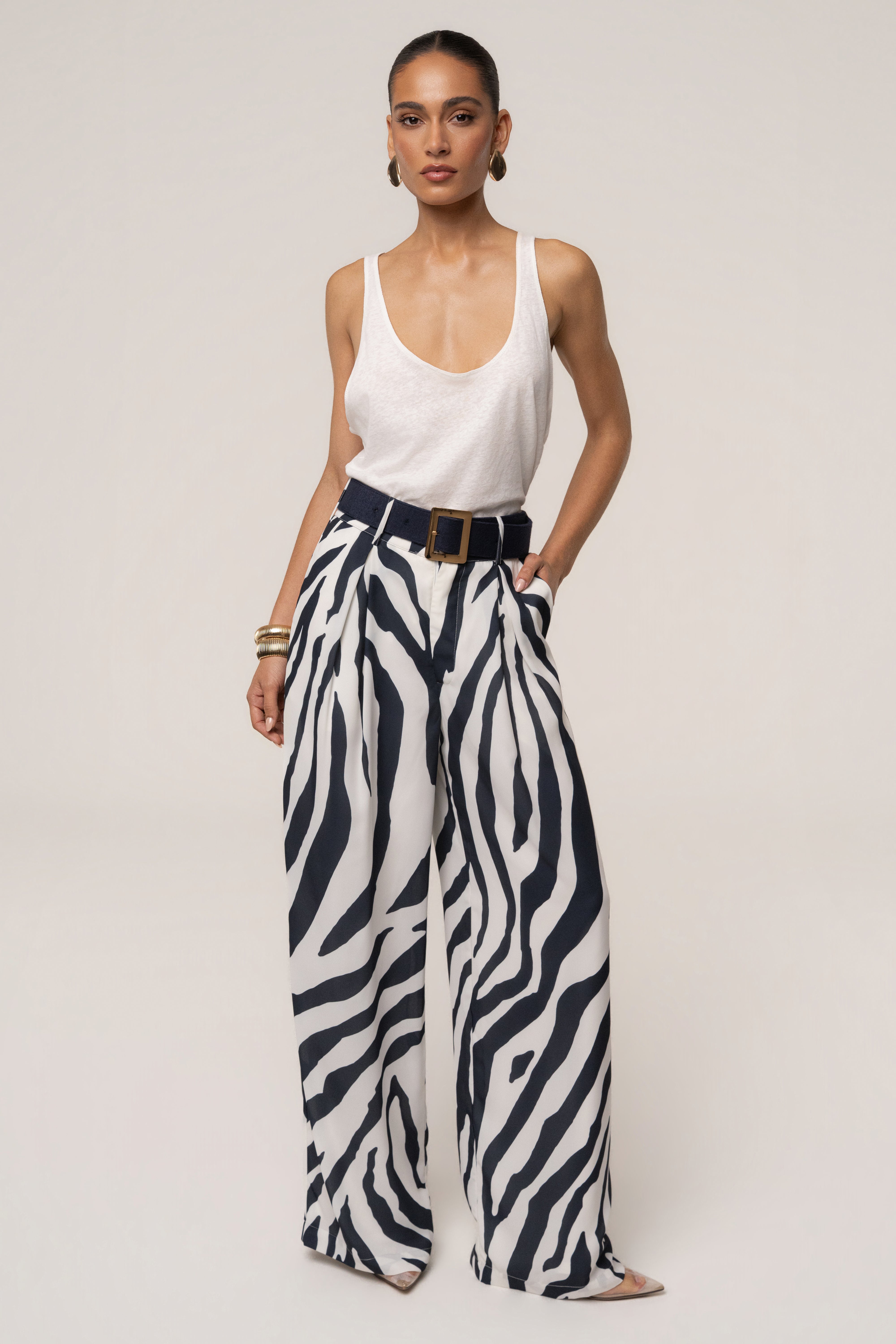 Navy zebra soft pleated trousers by JLUXLABEL, stylish bottoms with a relaxed fit and pleated design, perfect for casual or chic outfits.