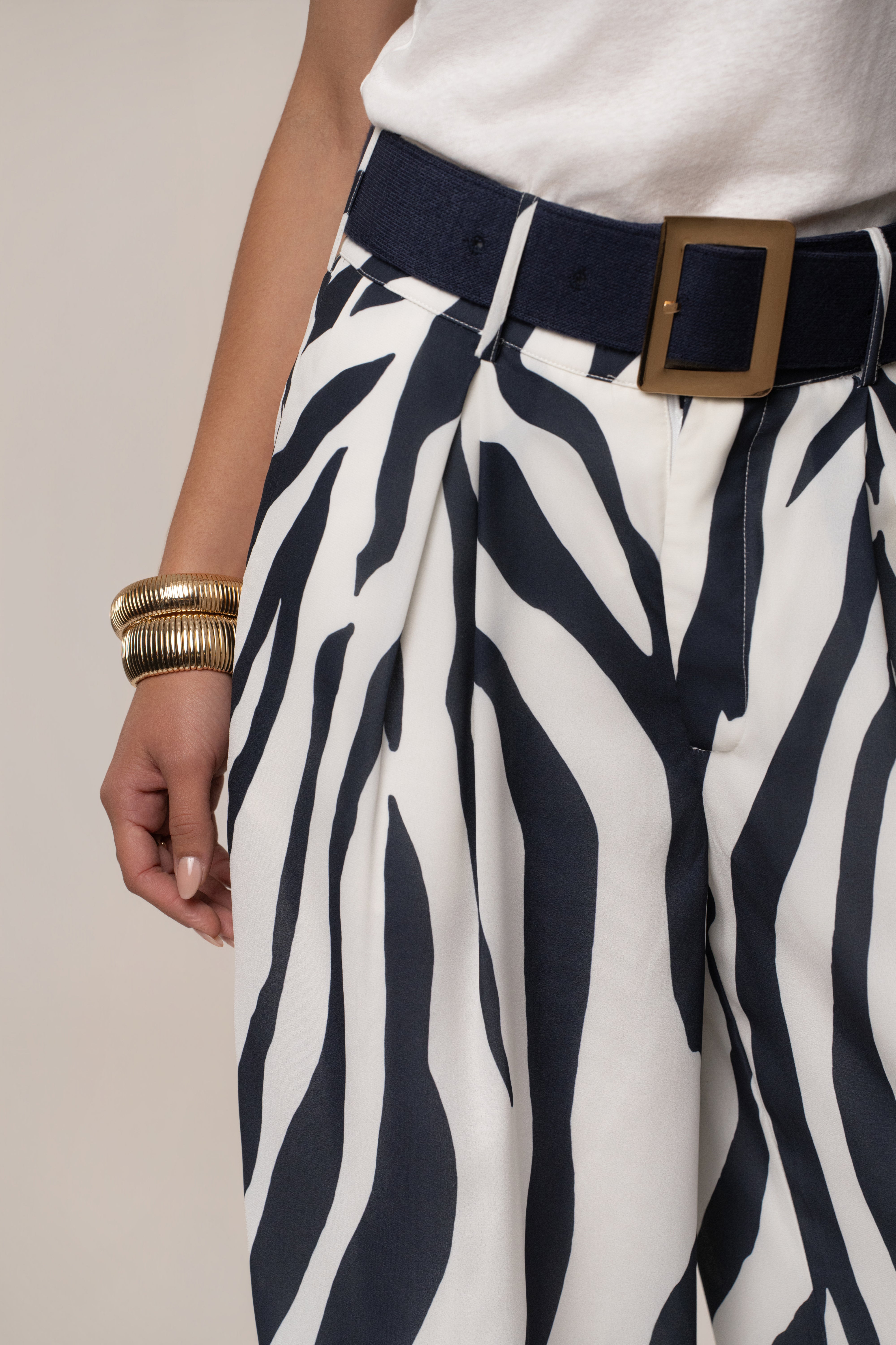 Navy zebra soft pleated trousers by JLUXLABEL, stylish bottoms with a pleated design and relaxed fit.