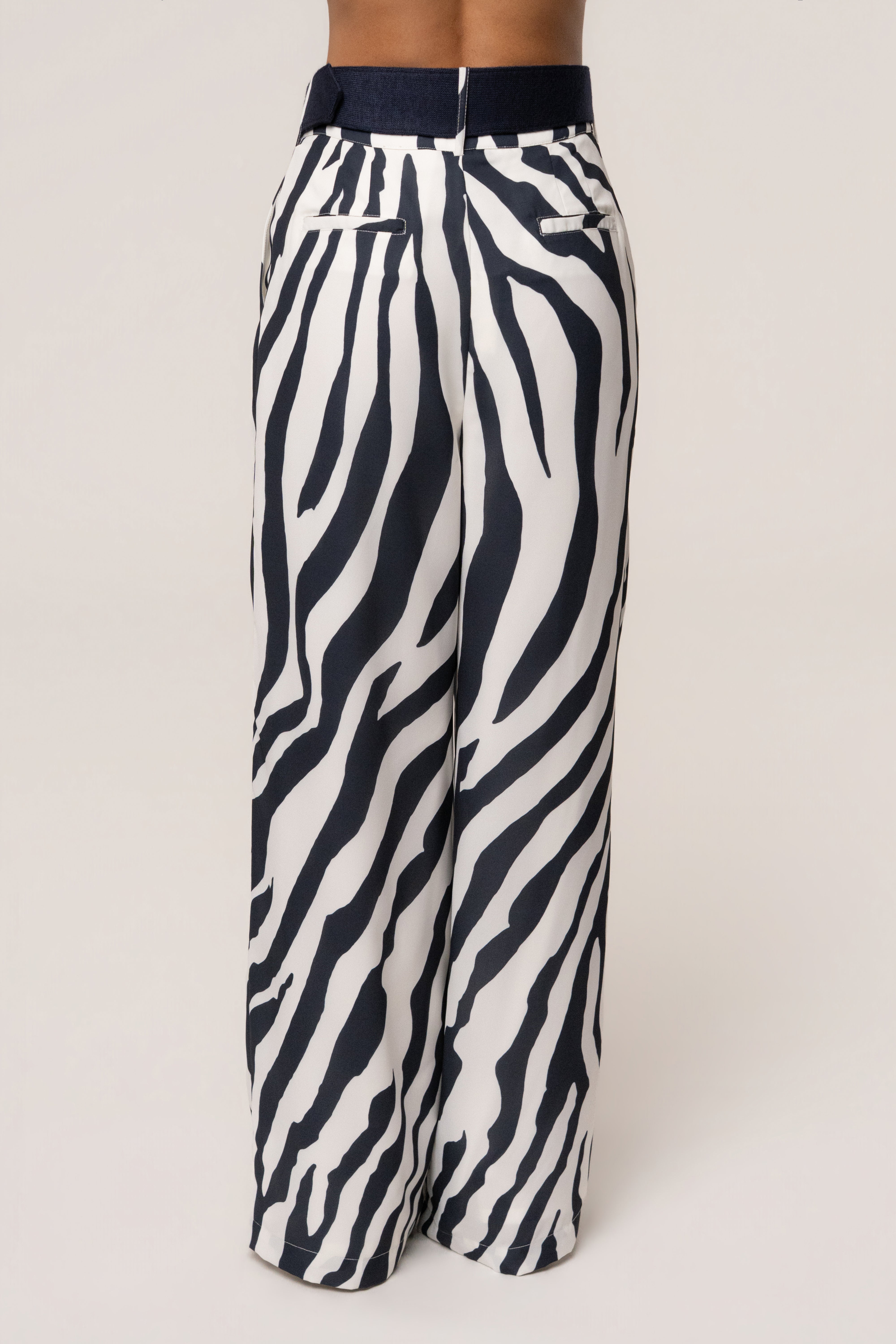 Navy zebra print soft pleated trousers for women by JLUXLABEL, showing the tailored fit and stylish design.