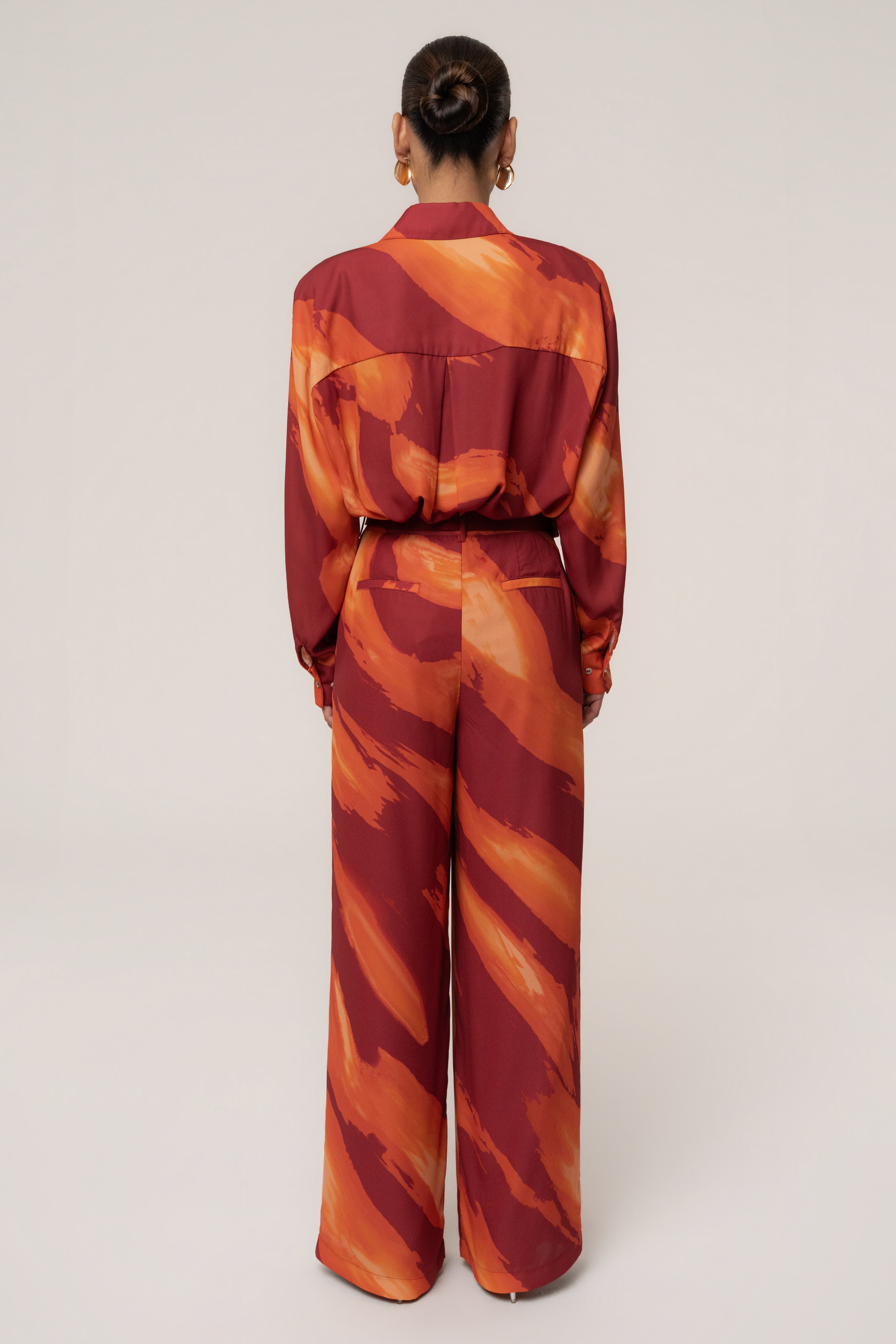 Crimson Dusk soft pleated trousers by JLUXLABEL, stylish women's bottoms with a relaxed fit and elegant pleats.