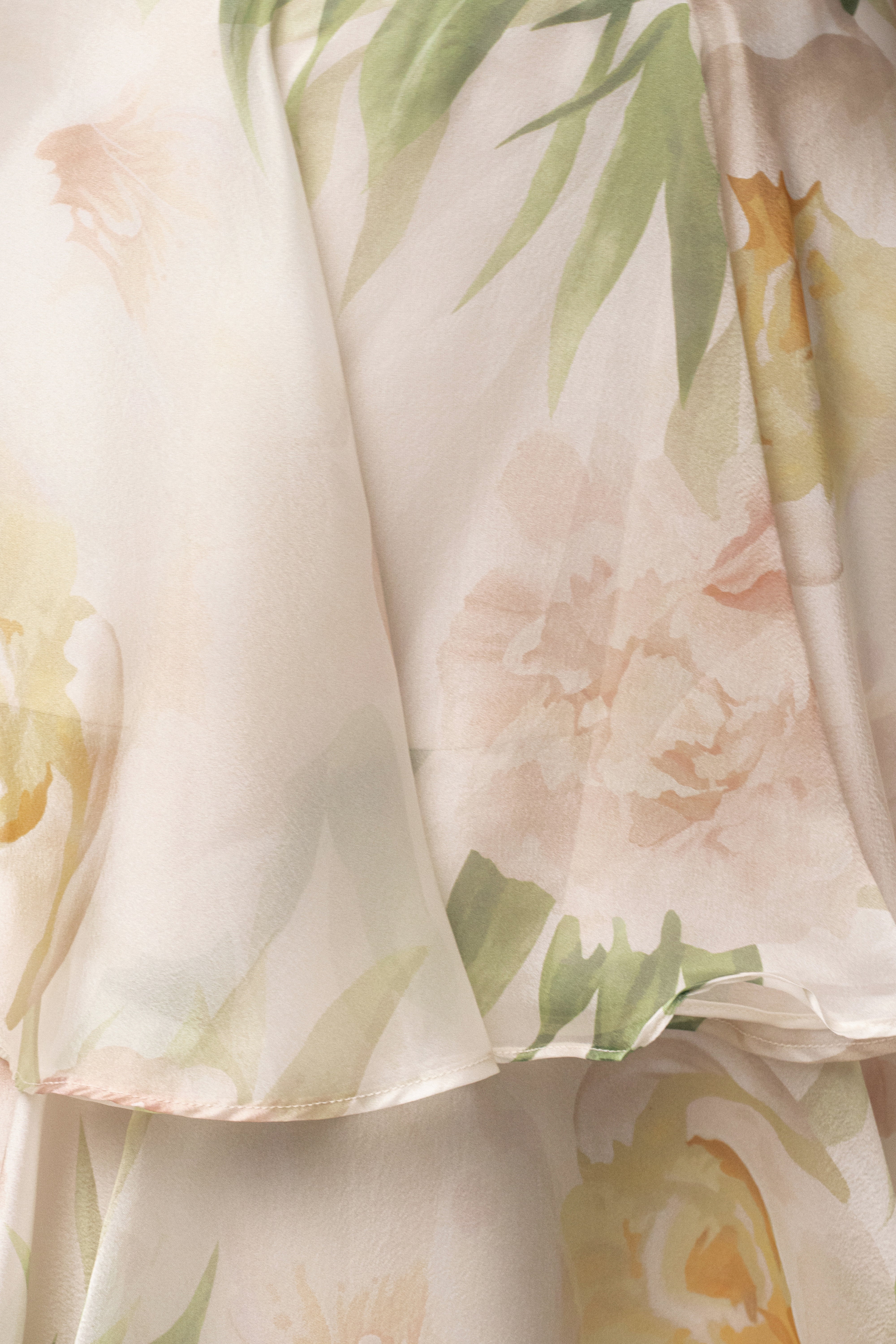 Cream Botanical Dreams skirt set by JLUXLABEL featuring a flowy skirt and matching top with botanical print.