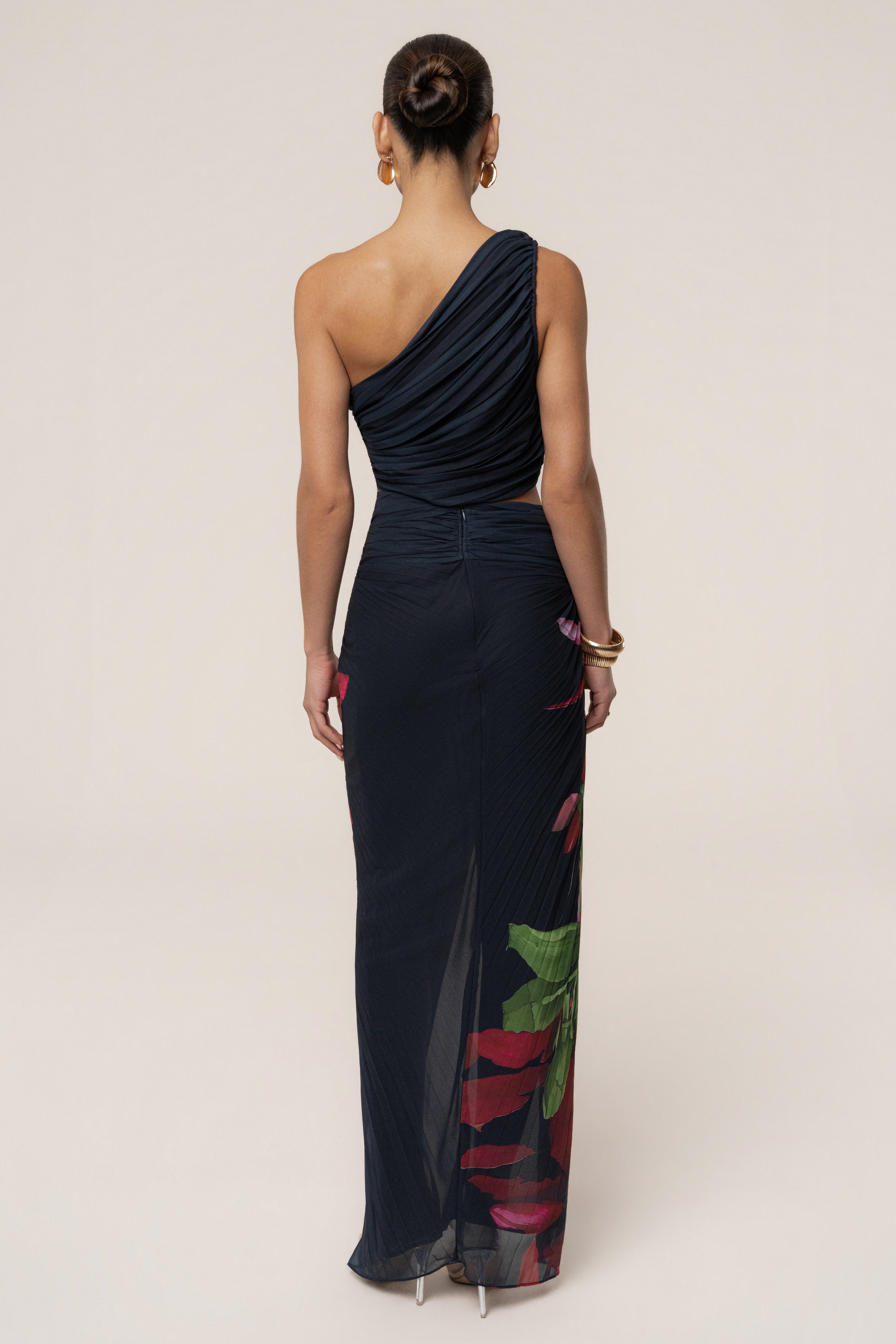 Navy Havana pleat skirt set by JLUXLABEL featuring a stylish pleated skirt and matching top on a model.