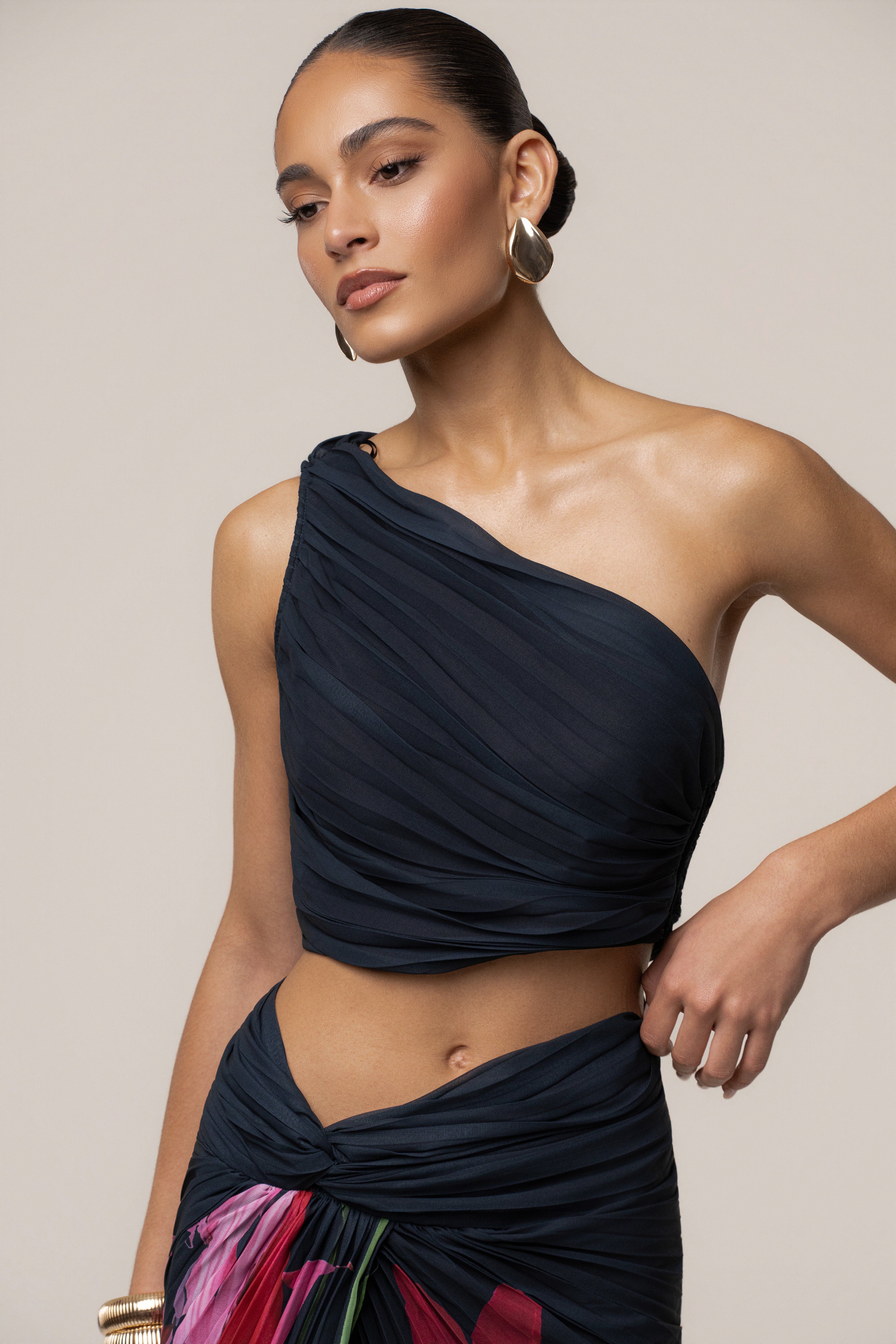 Navy Havana pleat skirt set by JLUXLABEL featuring a stylish pleated skirt and matching top on a white background.