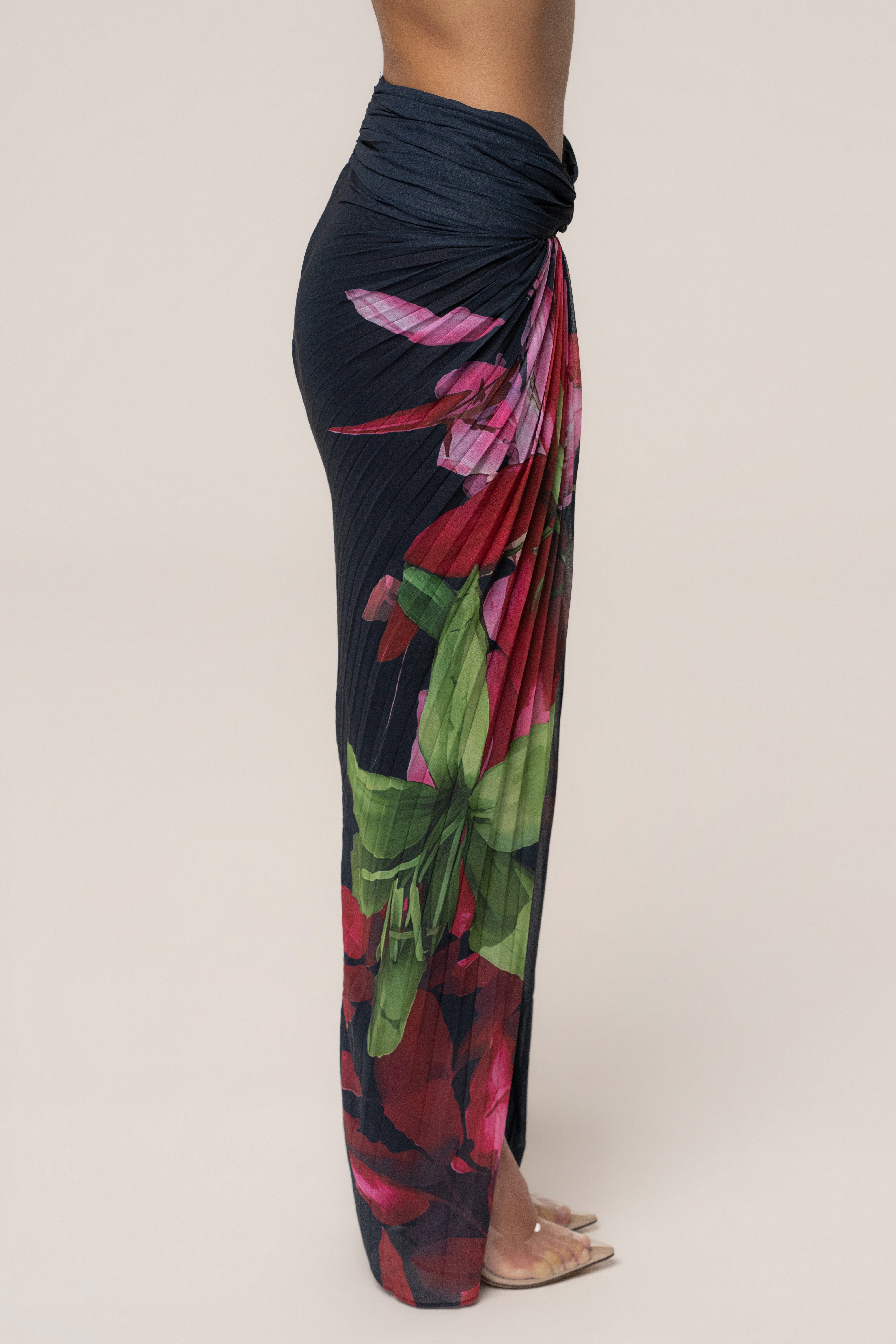 Navy Havana pleat skirt set by JLUXLABEL, featuring a stylish pleated skirt and matching top, displayed on a mannequin.