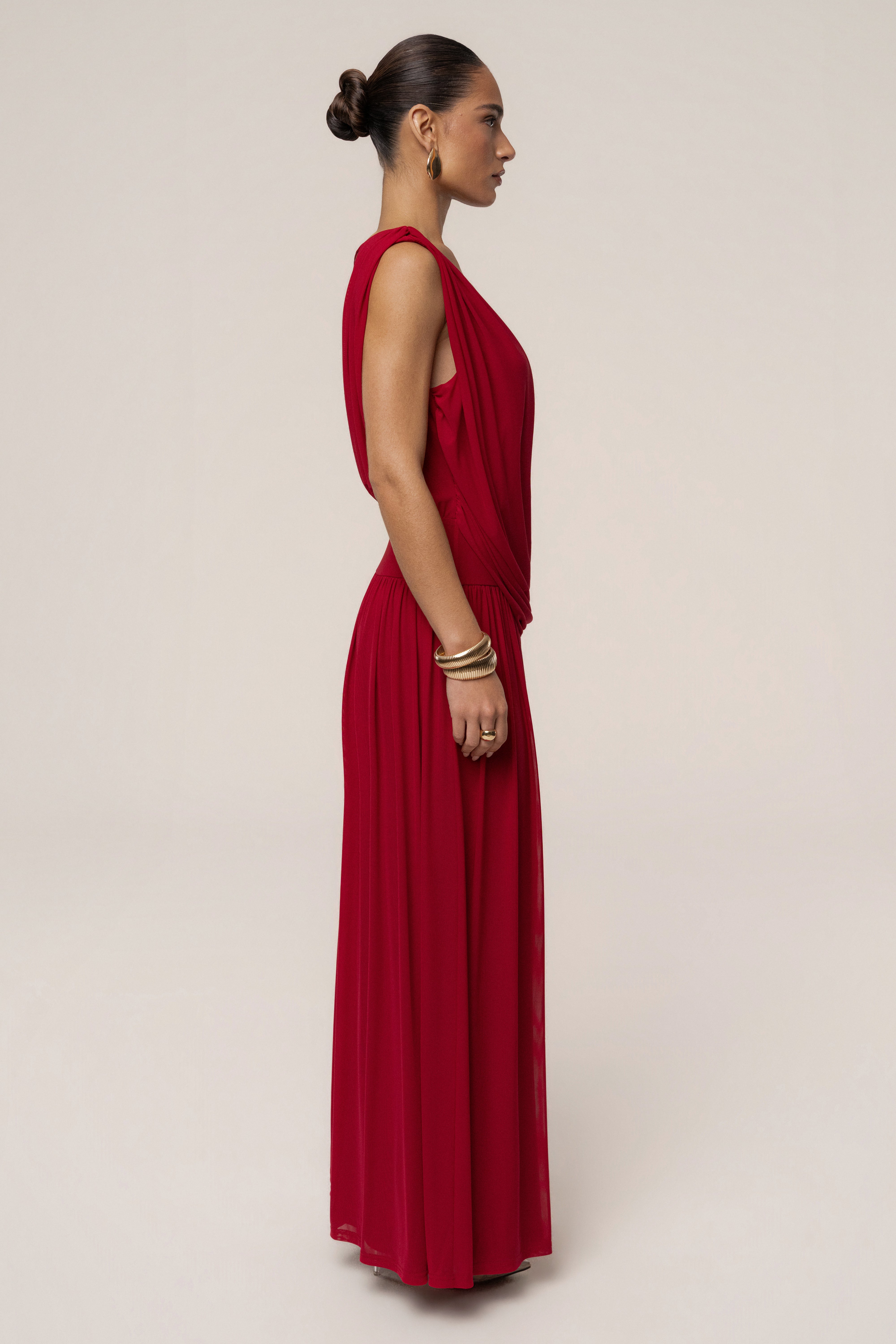 Red evening flow draped maxi dress by JLUXLABEL featuring elegant fabric and a graceful, flowing design.