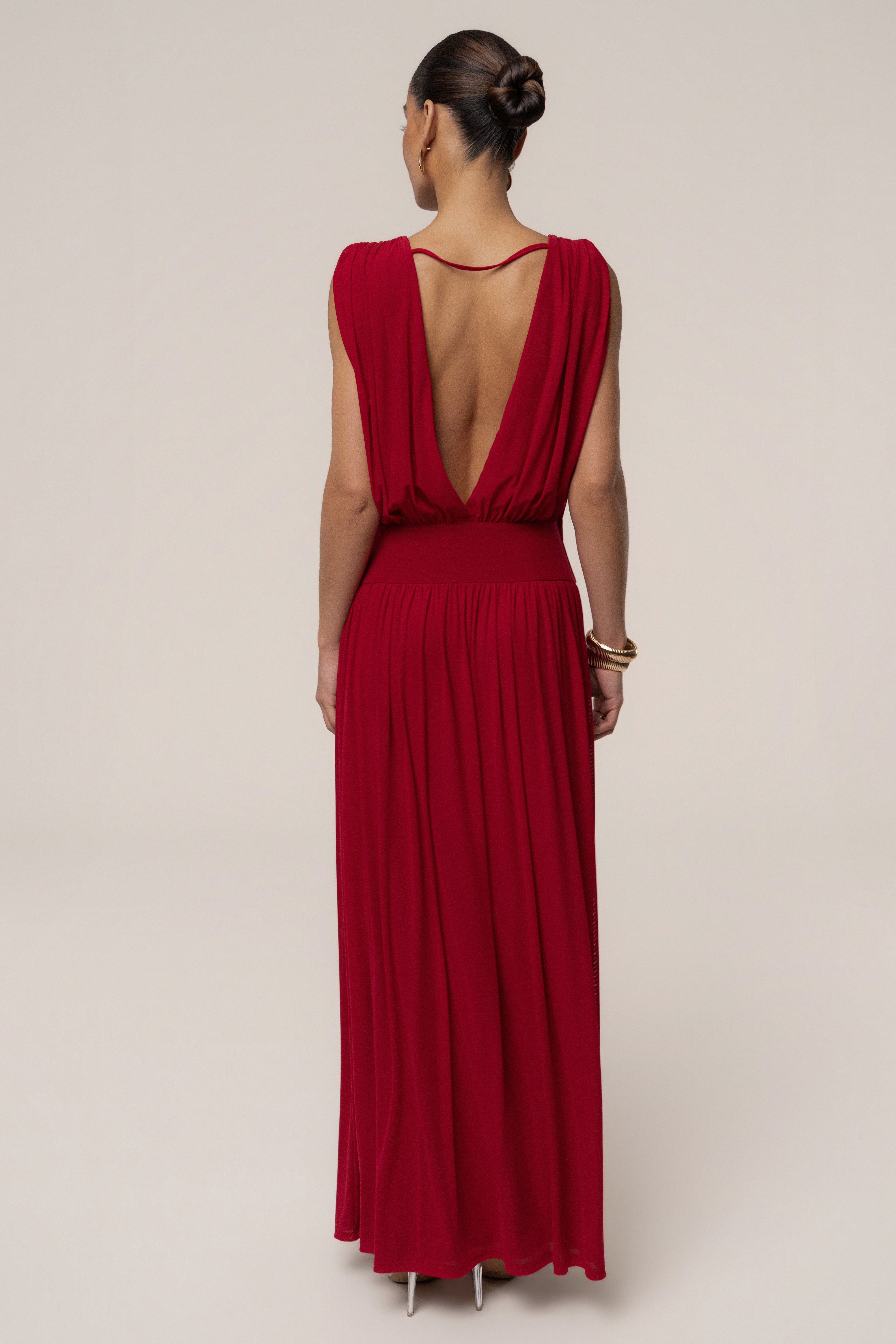 Red evening flow draped maxi dress by JLUXLABEL, featuring elegant fabric and a stylish, flowing silhouette perfect for formal occasions.