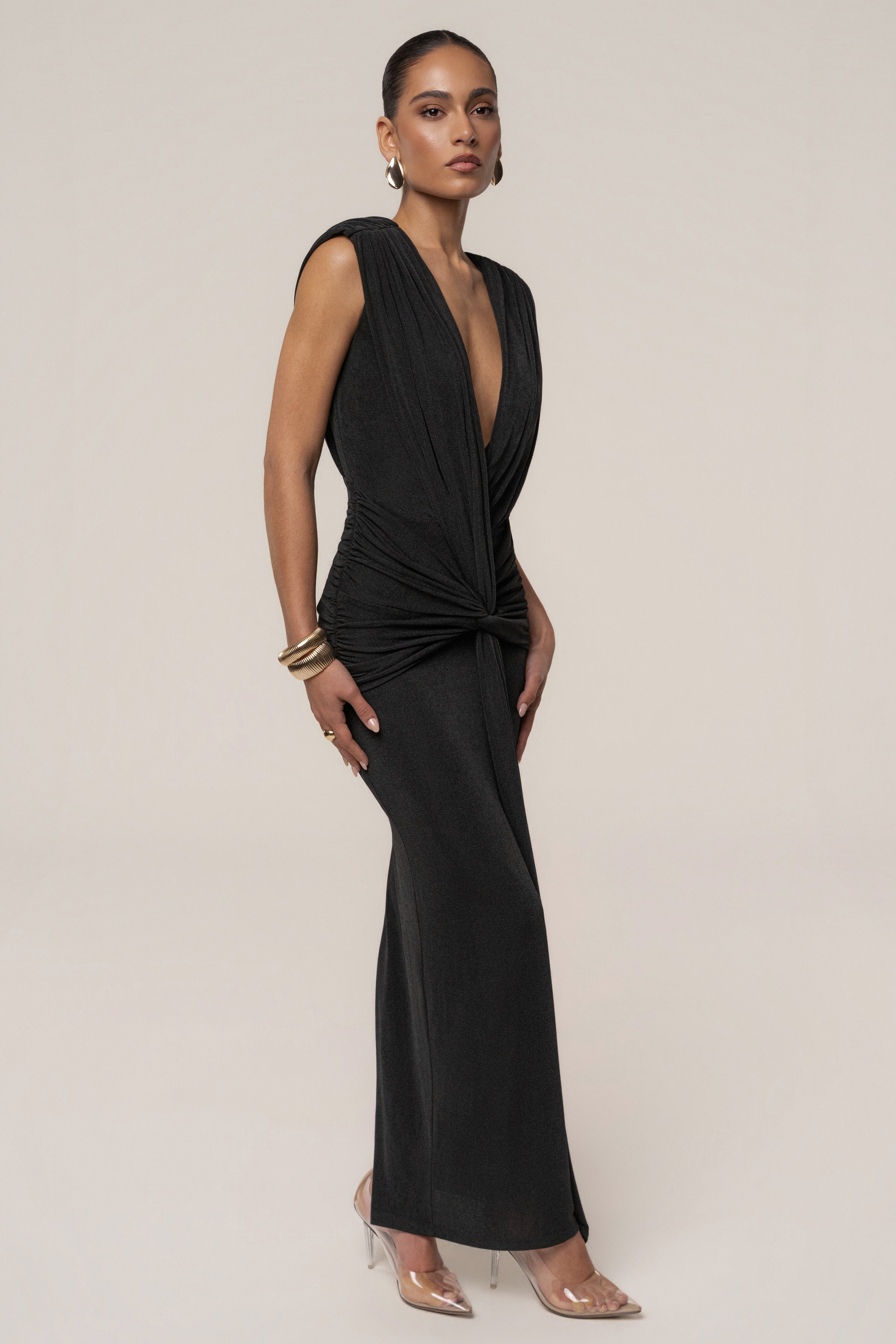 Black Palma Plunge Maxi Dress by JLUXLABEL featuring a deep V neckline, flowing fabric, and elegant silhouette.